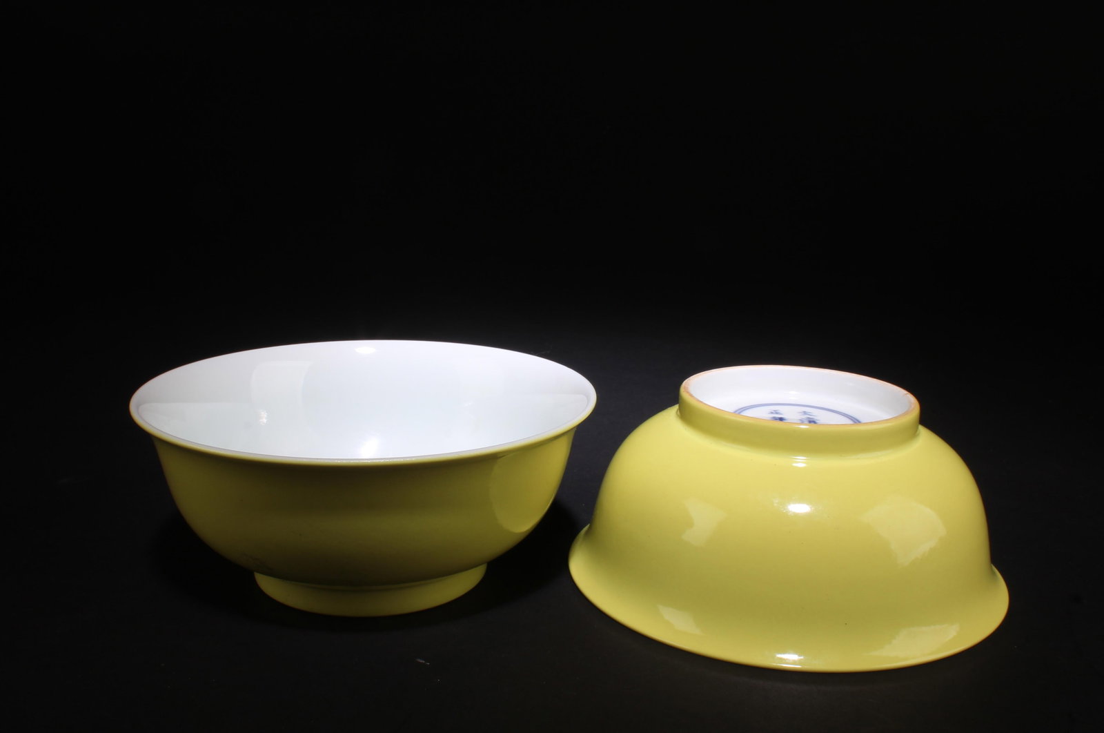 A Pair of Yellow Glazed Bowls: A Pair of Yellow Glazed Bowls. Dimensions: 5.5" x 2.3".