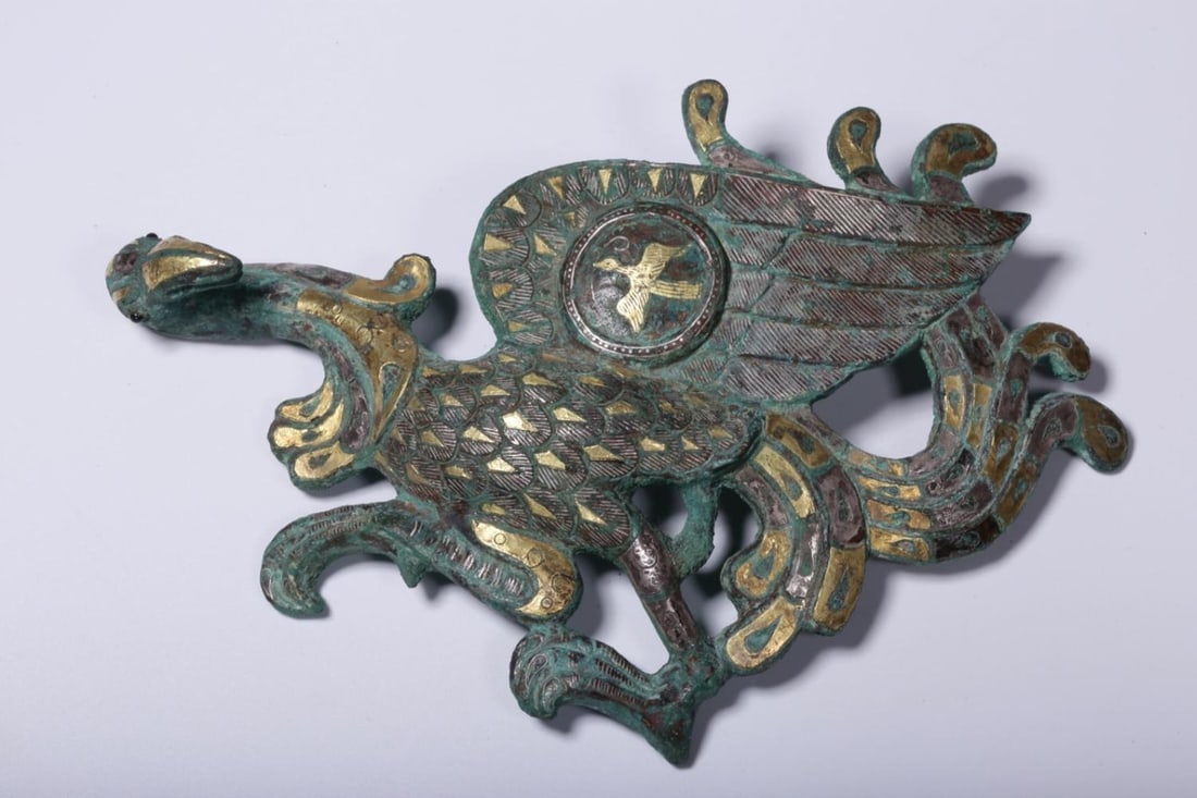 A Bronze Belt Hook: A Bronze Belt Hook. Length: 6.1" Width: 4.13" Thickness: 1.18" Weight: 0.67lbs.