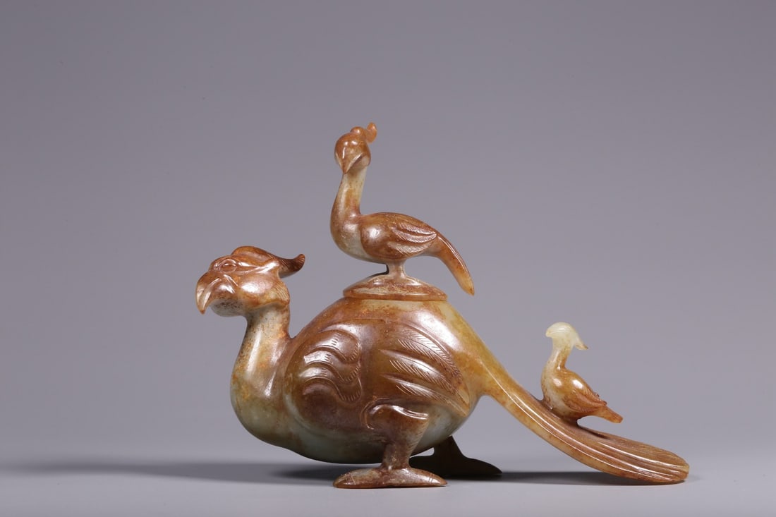 A Hetian Jade Water Coupe: A Hetian Jade Water Coupe. Height: 4.13" Length: 5.71" Width: 1.77" Weight: 0.58lbs.