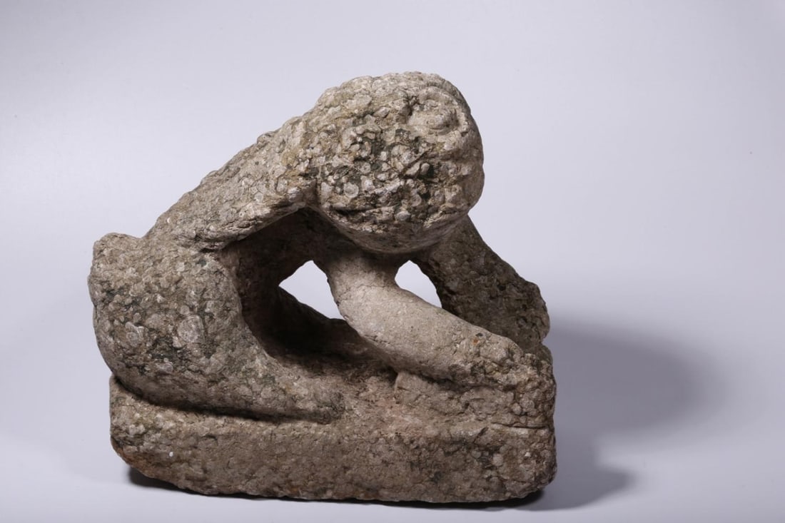 A Stone Lion Ornament: A Stone Lion Ornament. Height: 10.24" Length: 11.02" Width: 5.51" Weight: 55.12lbs.