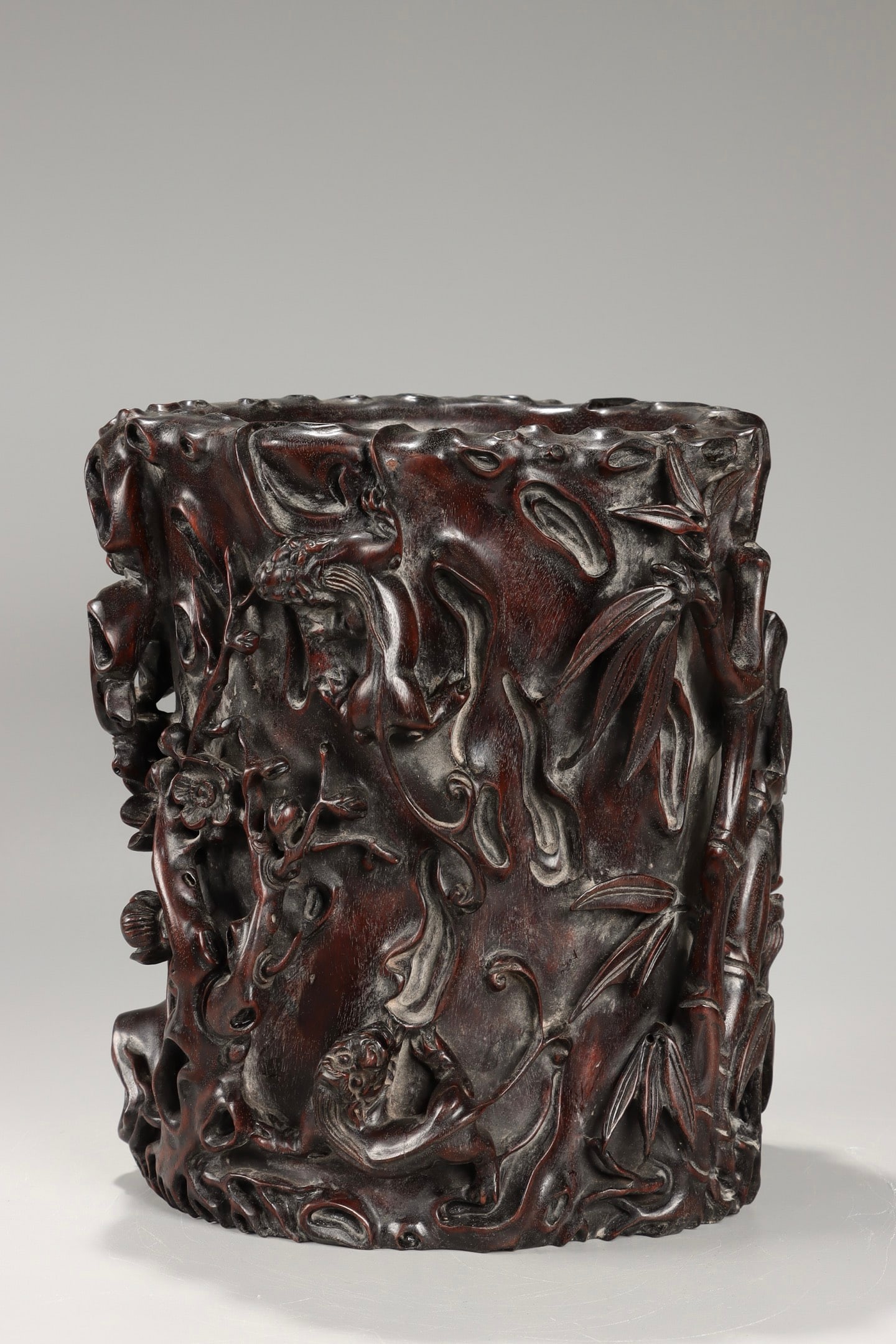 A Zitan Brushpot: A Zitan Brushpot. Height: 8.86" Width: 7.48" Weight: 5lbs.