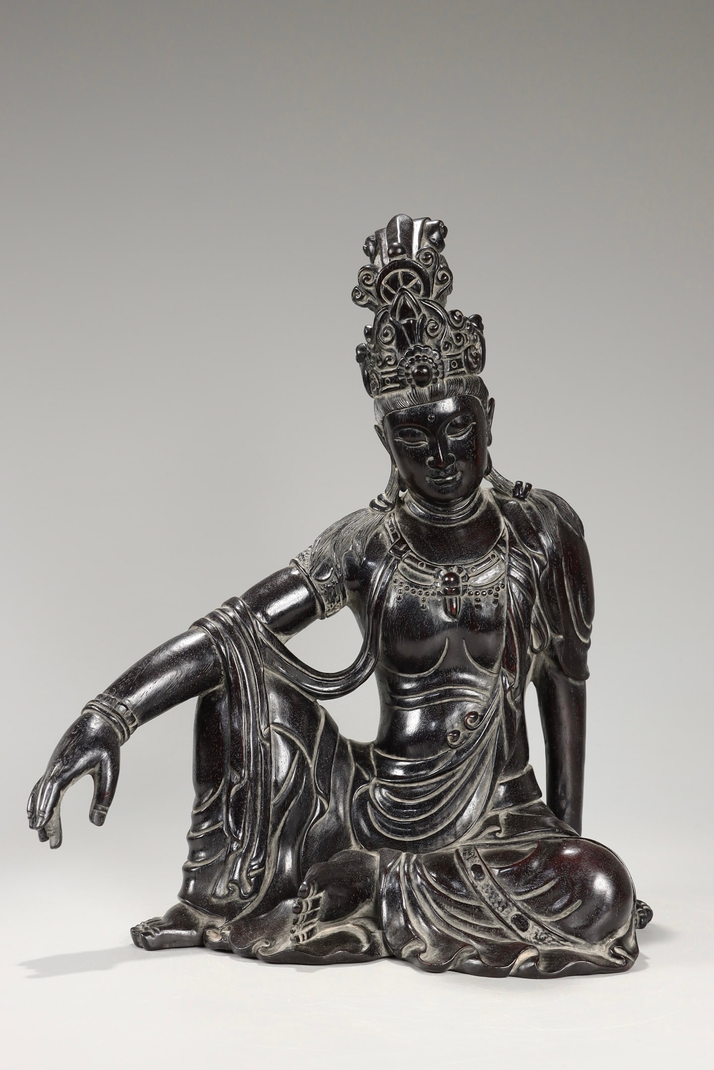 A Zitan Guanyin Statue: A Zitan Guanyin Statue. Height: 11.81" Length: 7.87" Width: 5.31" Weight: 3.89lbs.