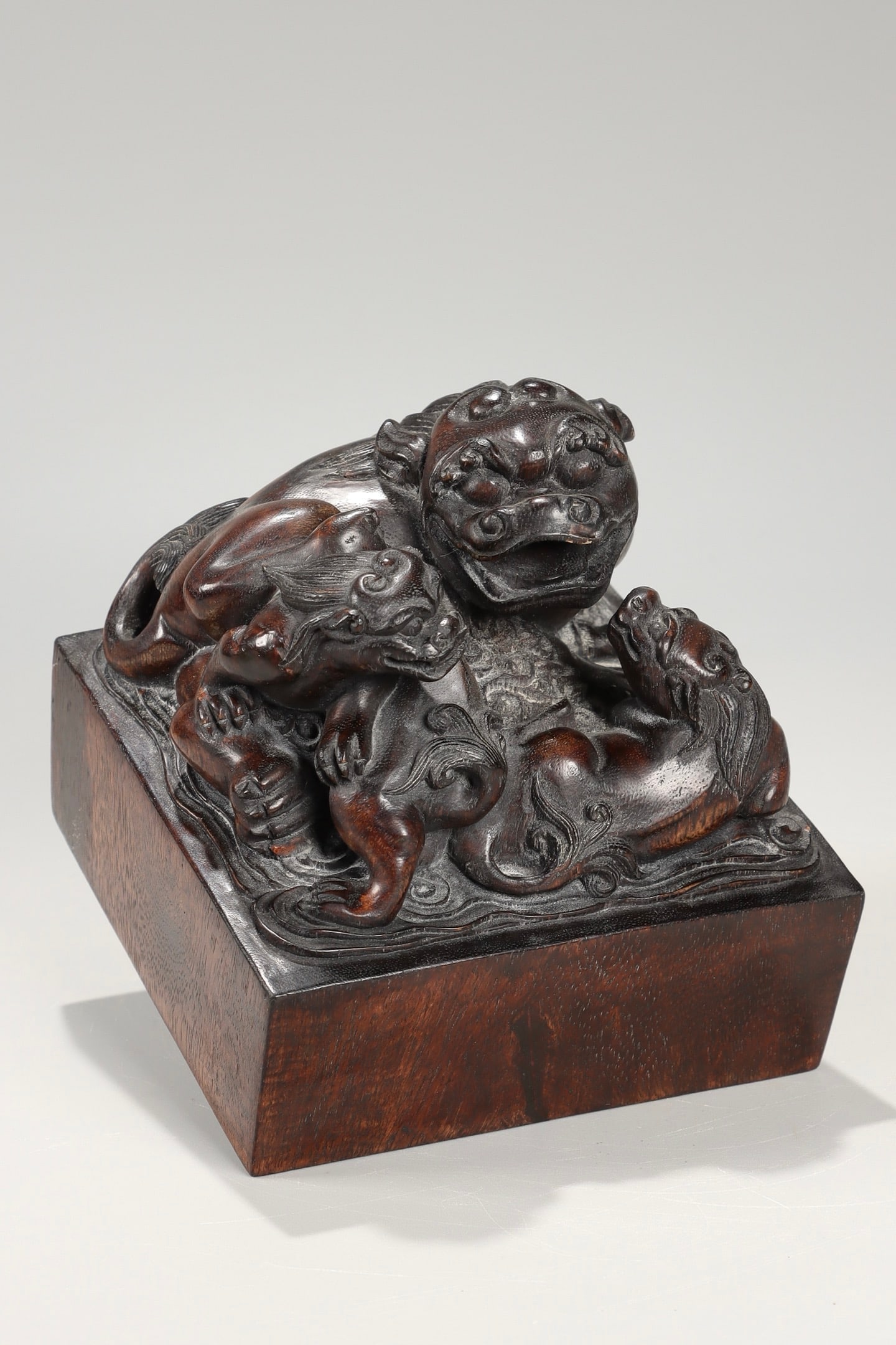 An Agarwood Seal: An Agarwood Seal. Height: 4.53" Width: 4.8" Weight: 0.82lbs.