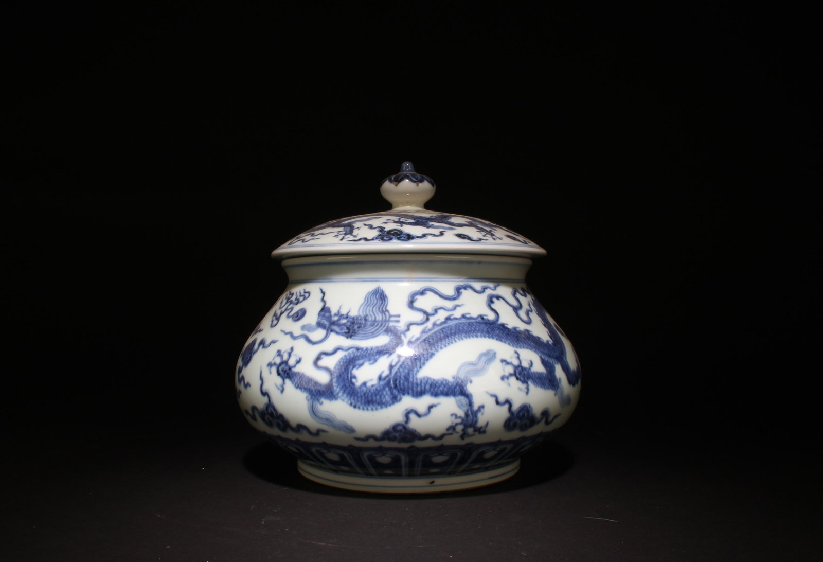 A Blue and White Jar with Lid: A Blue and White Jar with Lid. Dimensions: 9" x 7.5".