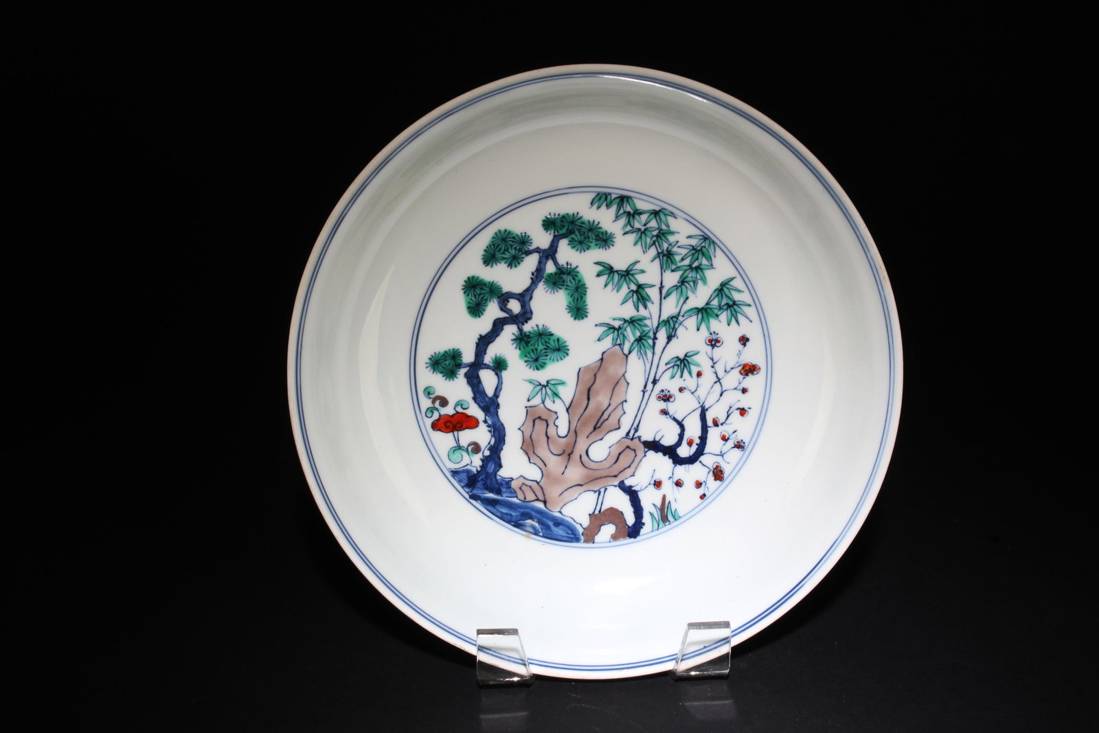 A Doucai Plate with Scenery Motif: A Doucai Plate with Scenery Motif. Dimensions: 8.5" x 2".