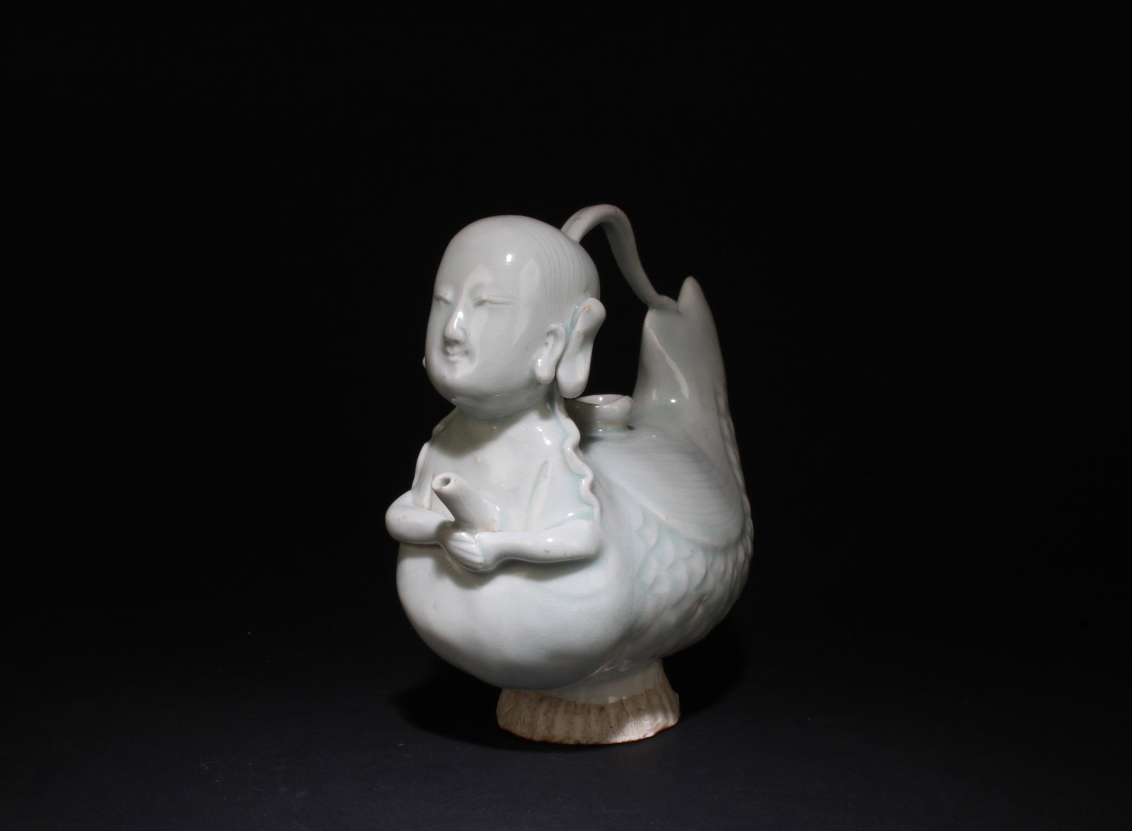 A Yingqing Teapot: A Yingqing Teapot. Dimensions: 6.5" x 6" x 3.5".