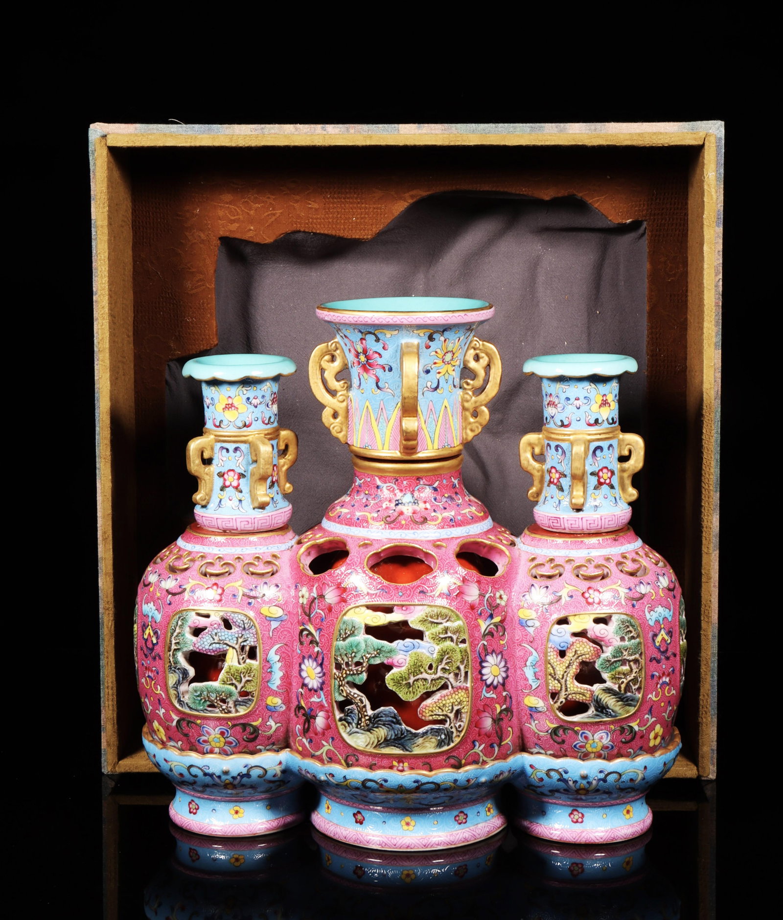 A Three Conjoined Falangcai Porcelain Vase: A Three Conjoined Falangcai Porcelain Vase. "QianLong" mark at base. Dimensions: 11" x 10.6".