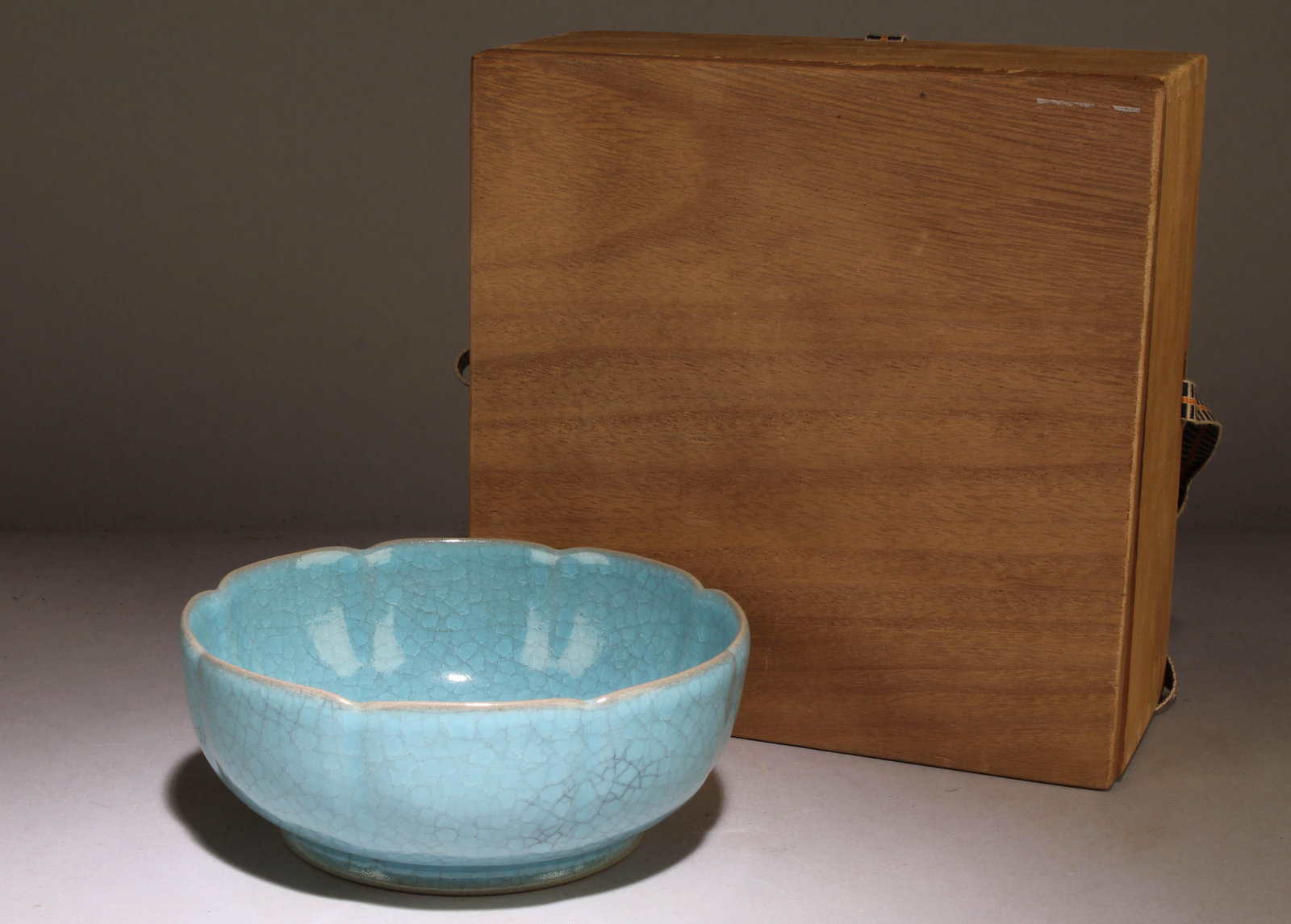 A Ruyao Chinese Bowl: A Ruyao Chinese Bowl. Dimension: 2.4" x 6".