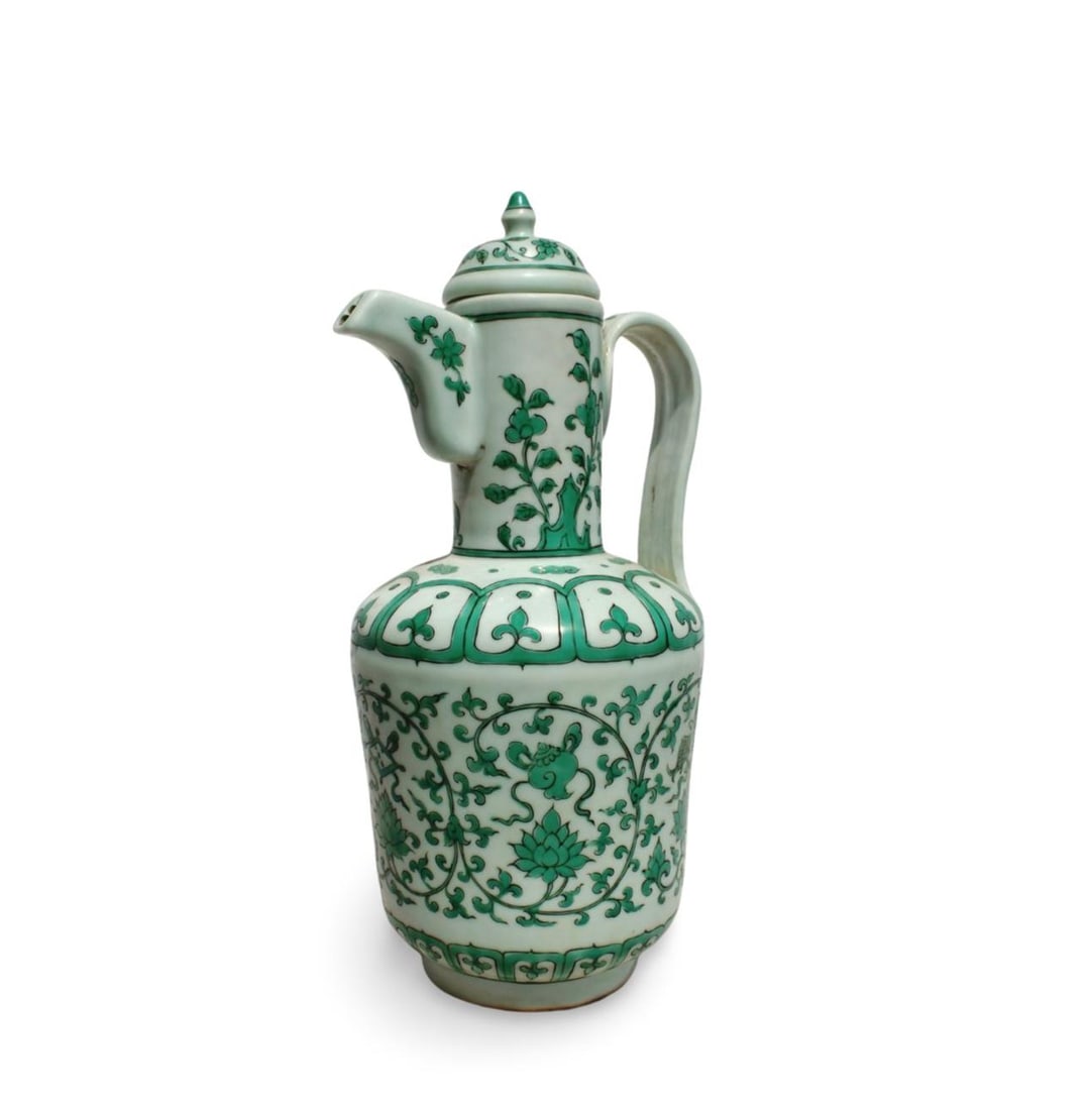 A Green and White Pot: A Green and White Pot. Dimension: 8" x 15.25".