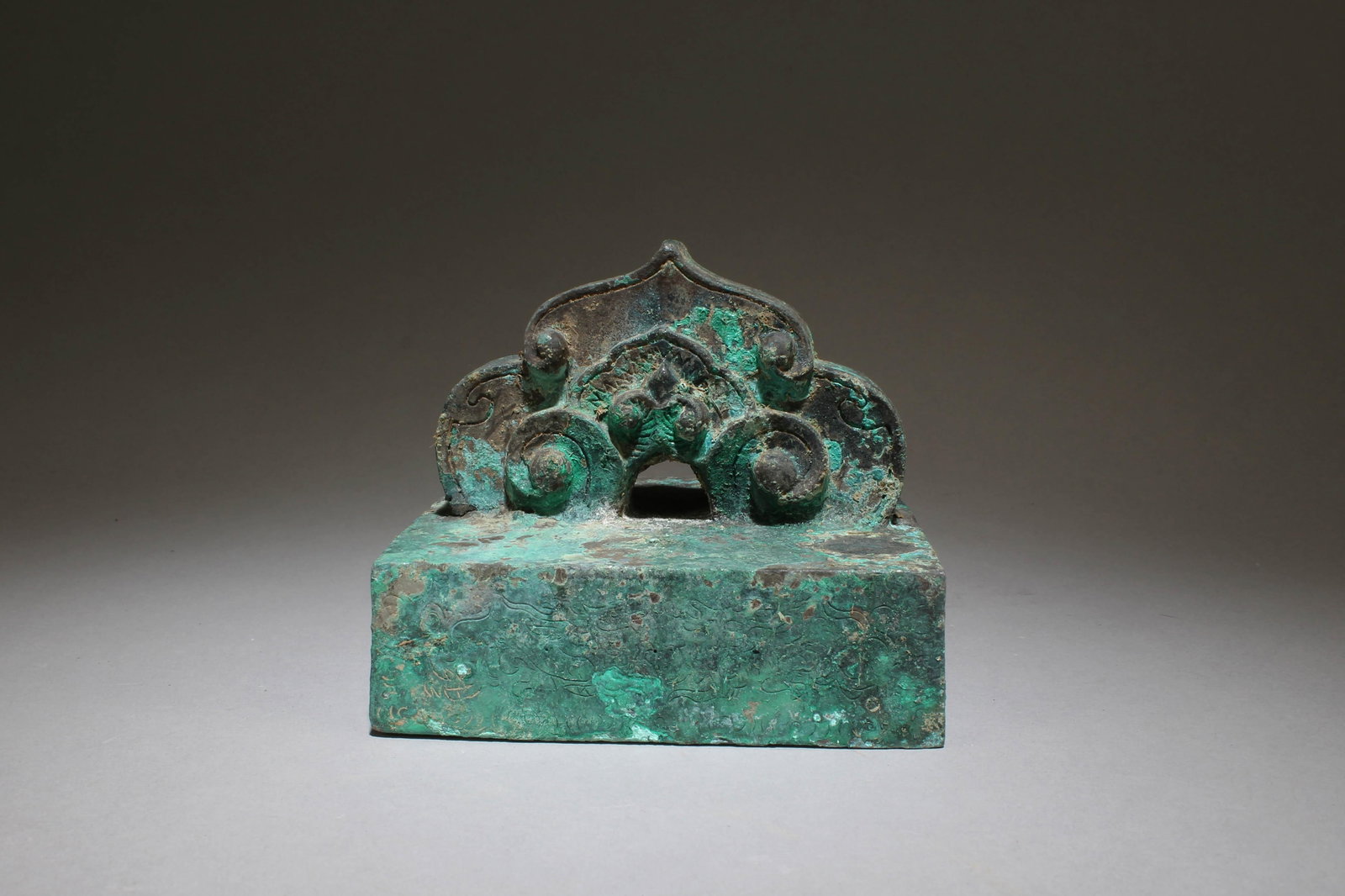 A Bronze Stamp: A Bronze Stamp. Dimensions: 4.5" x 3.75"