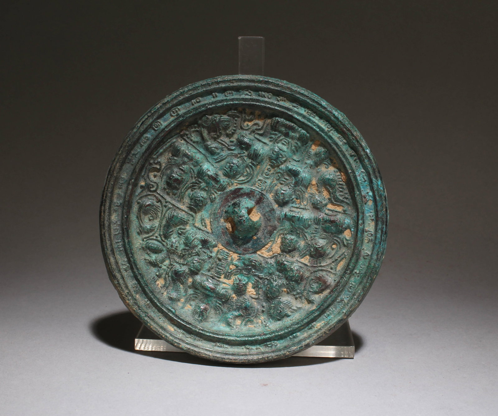 A Bronze Mirror: A Bronze Mirror. Diameter: 4.5"
