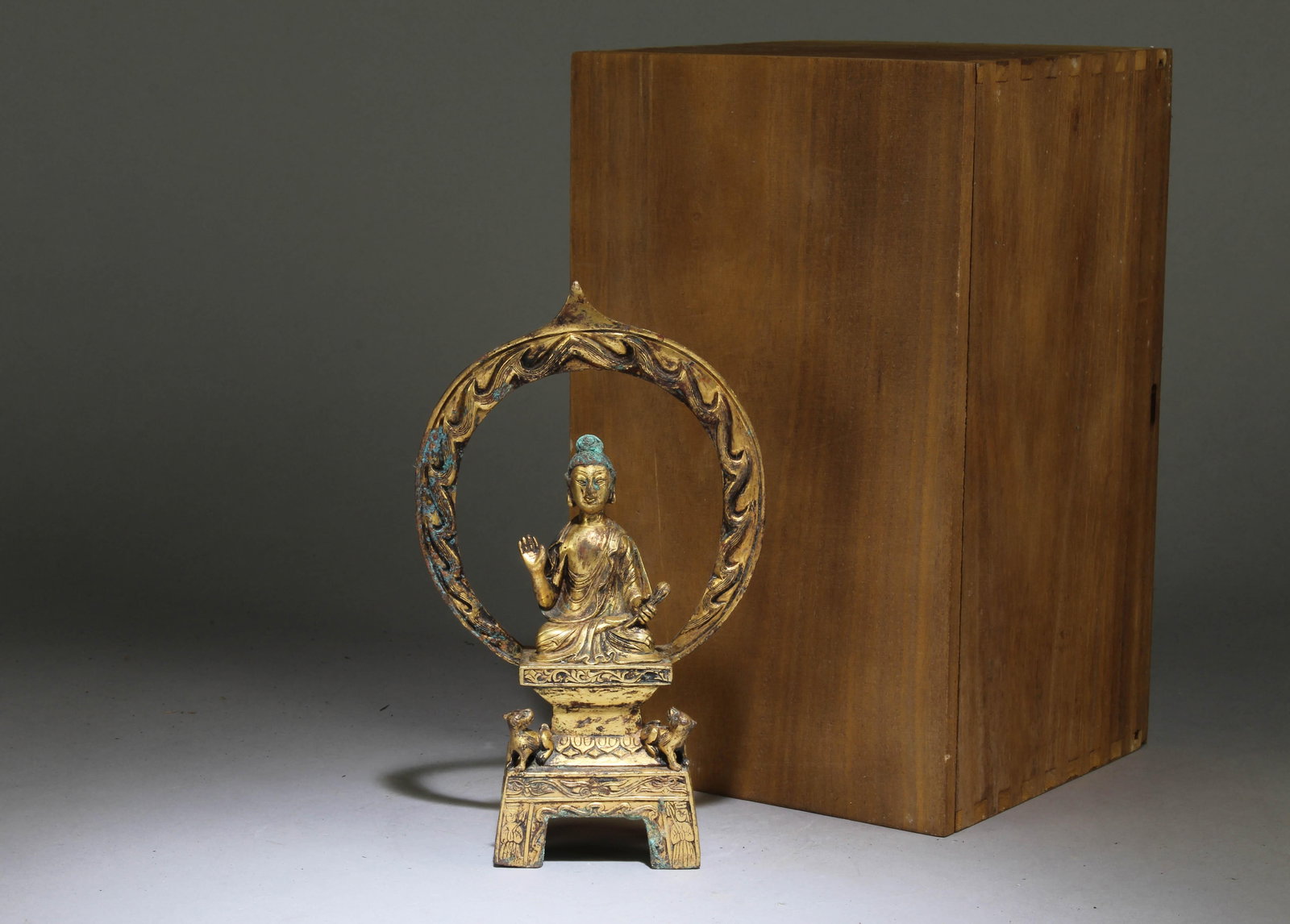 A Chinese Gilt Bronze Buddha: A Chinese Gilt Bronze Buddha. Dimension: 7.5" x 4.5" x 1.75".