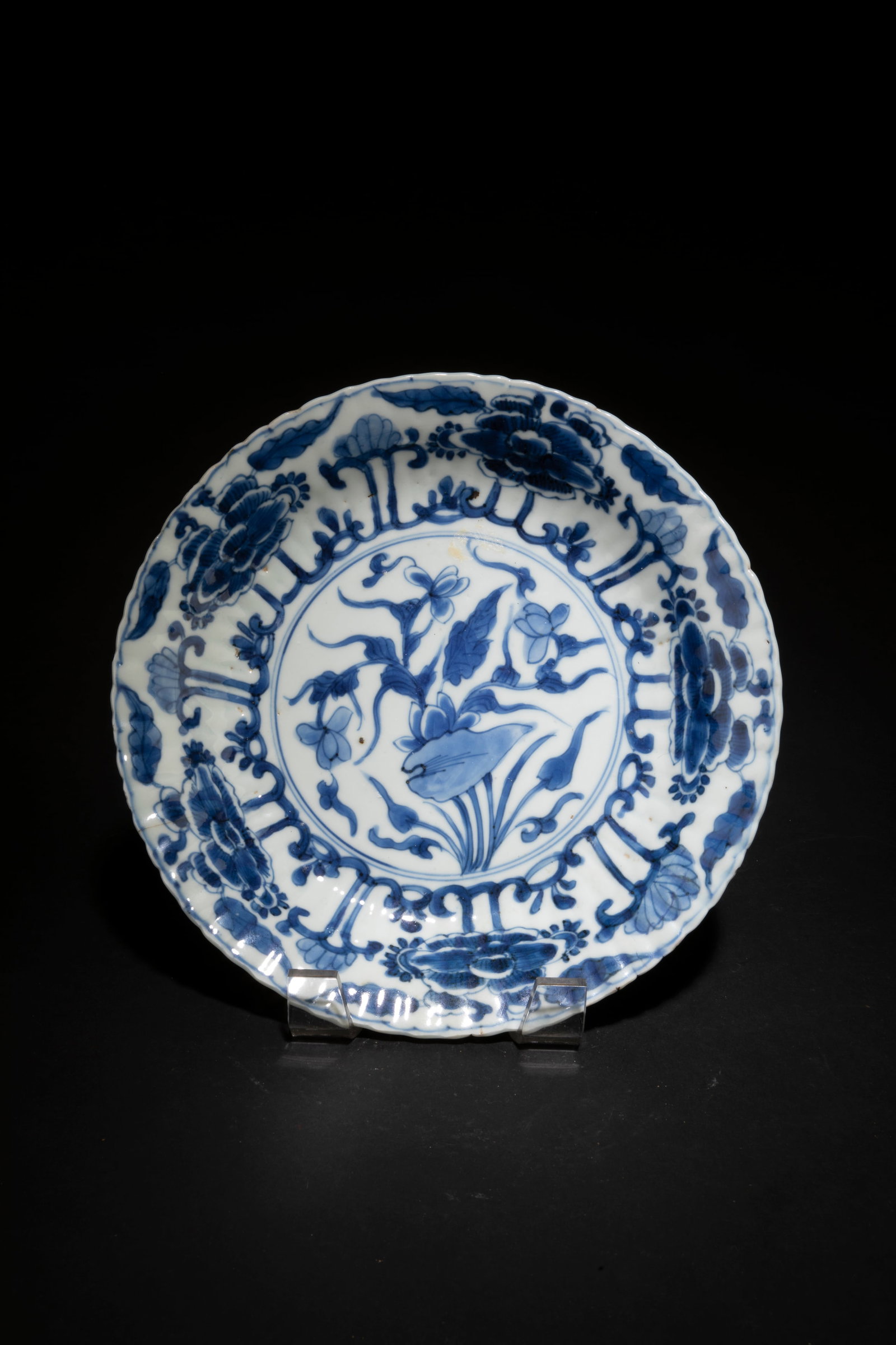 A Blue & White Porcelain Plate: A Blue & White Porcelain Plate. Diameter: 8.35"