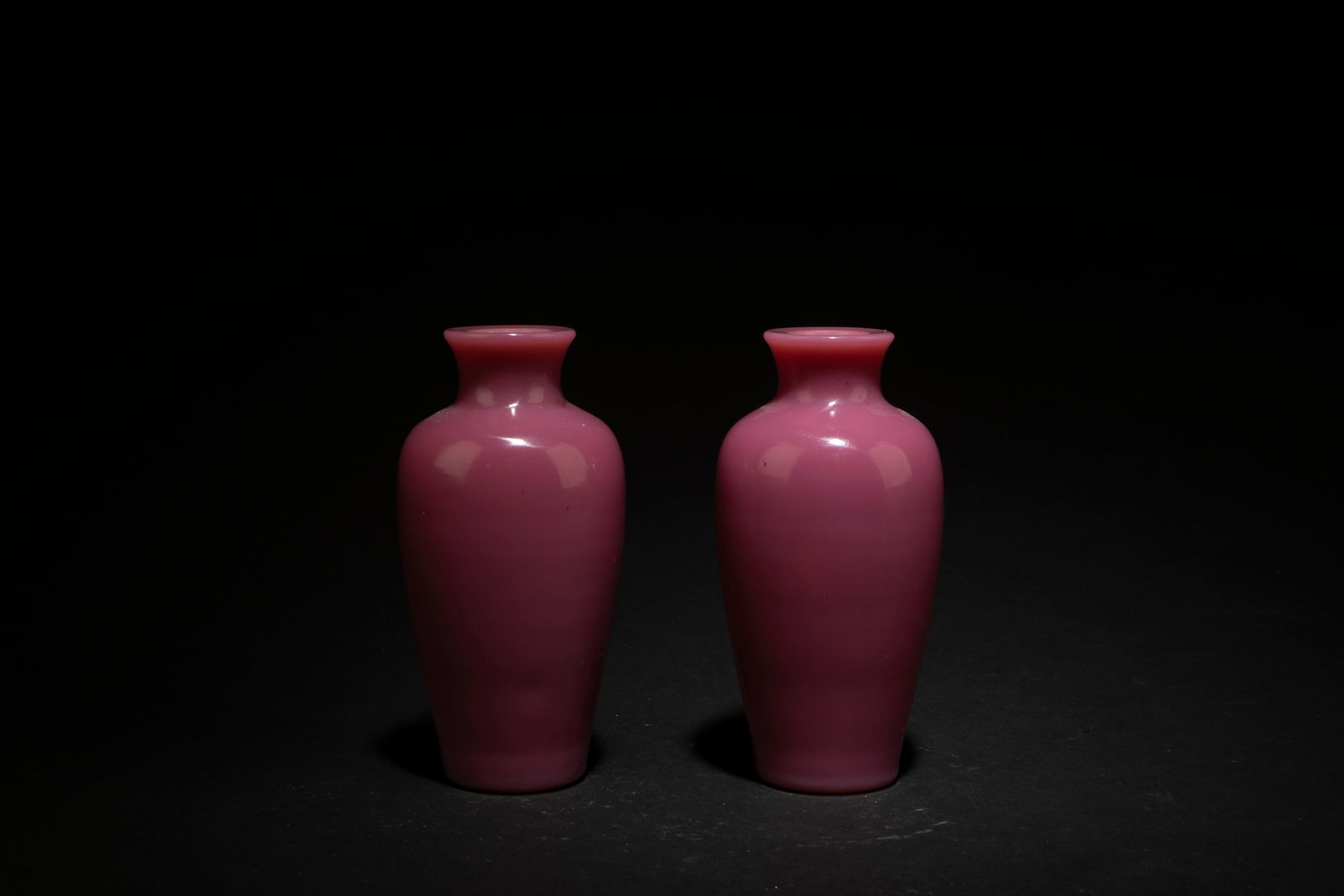 A Pair of Peking Glass Vases: A Pair of Peking Glass Vases. Comes fitted with wooden stand. Height: 5.5" (with stand)