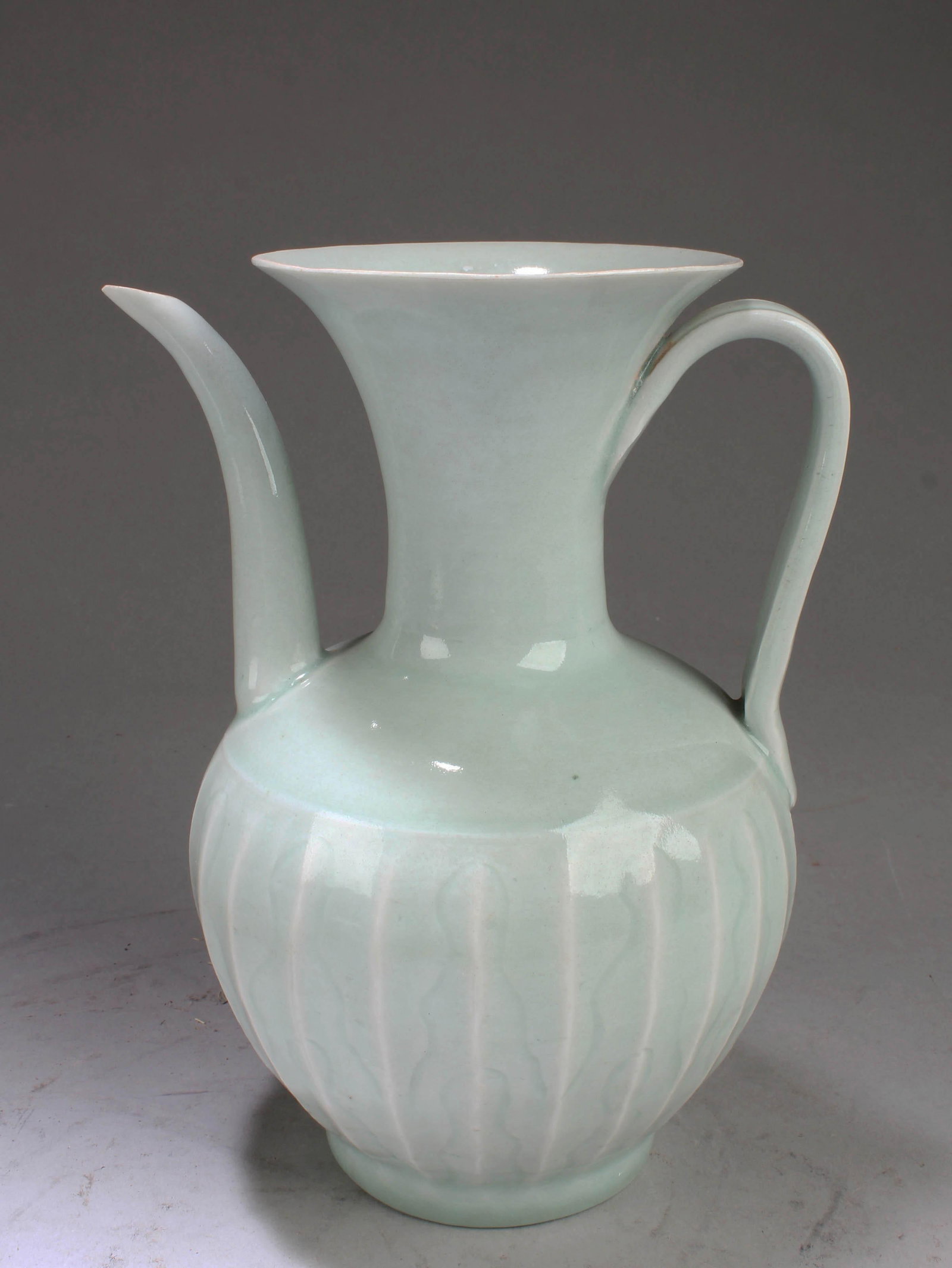 Chinese Porcelain Ewer: Chinese Porcelain Ewer. Height: 7.75"