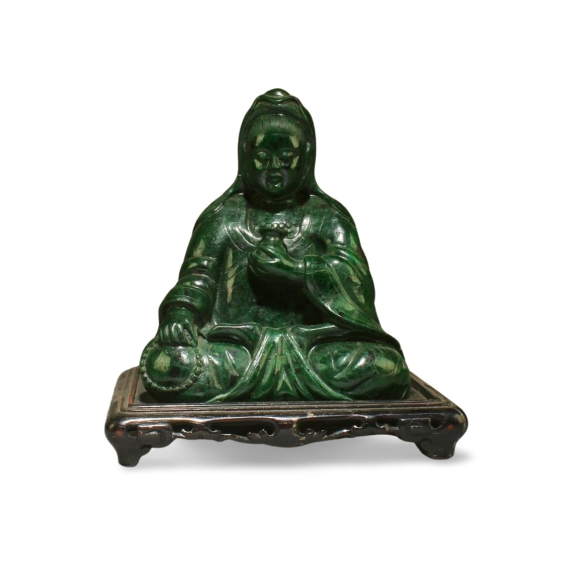 Chinese Carved Malachite Sitting Guanyin Statue: Chinese Carved Malachite Sitting Guanyin Statue. Comes fitted with a wooden stand. Height: 3.5"