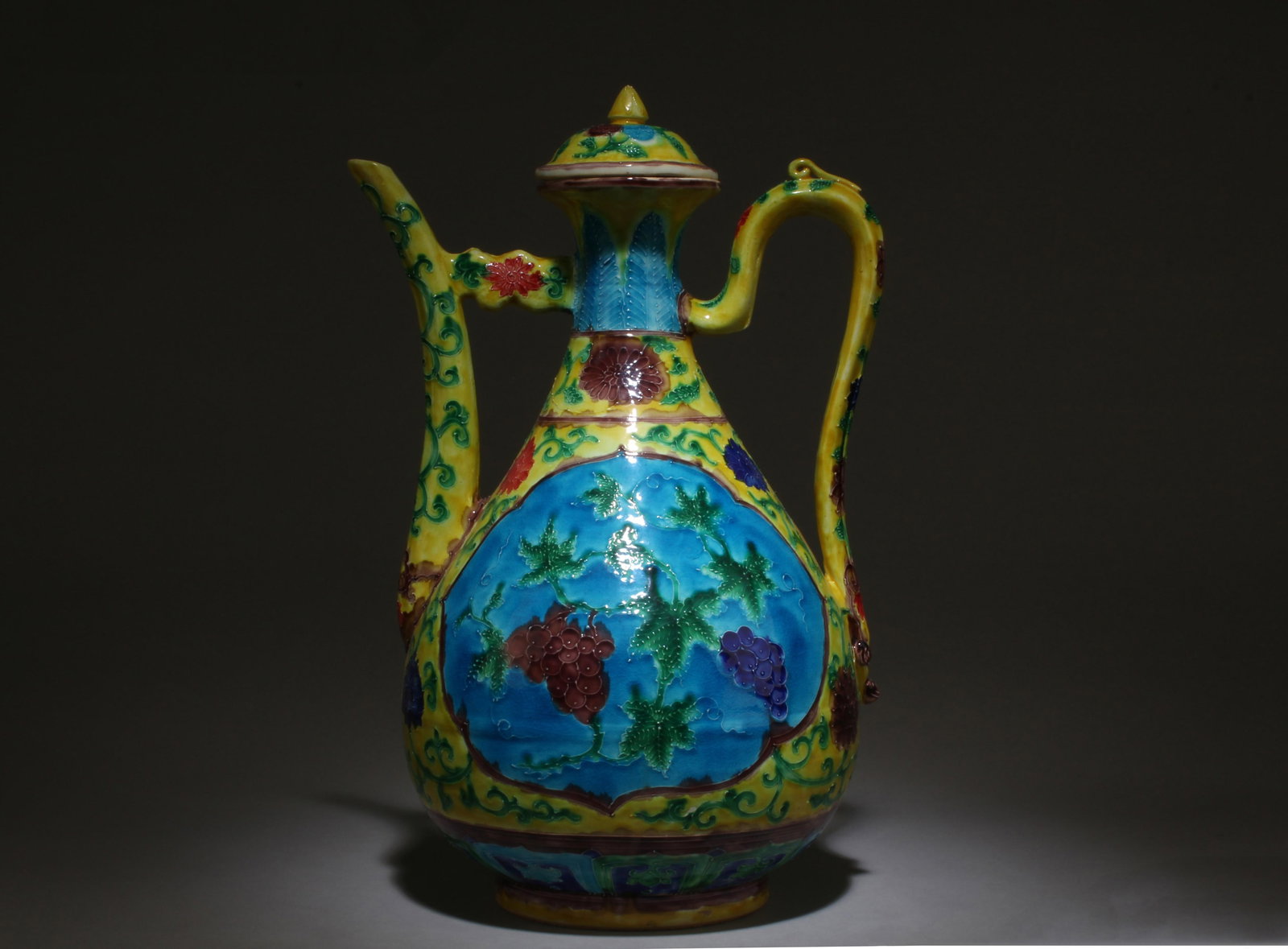 A Porcelain Teapot: A Porcelain Teapot. Dimensions: 13.5" x 8.5".