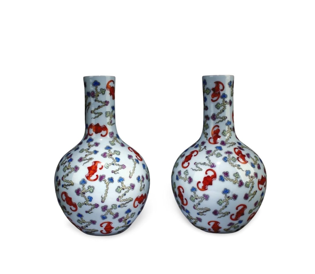A Pair of Famille Rose Vase: A Pair of Famille Rose Vase. Dimensions: 9.5" x 5.5".