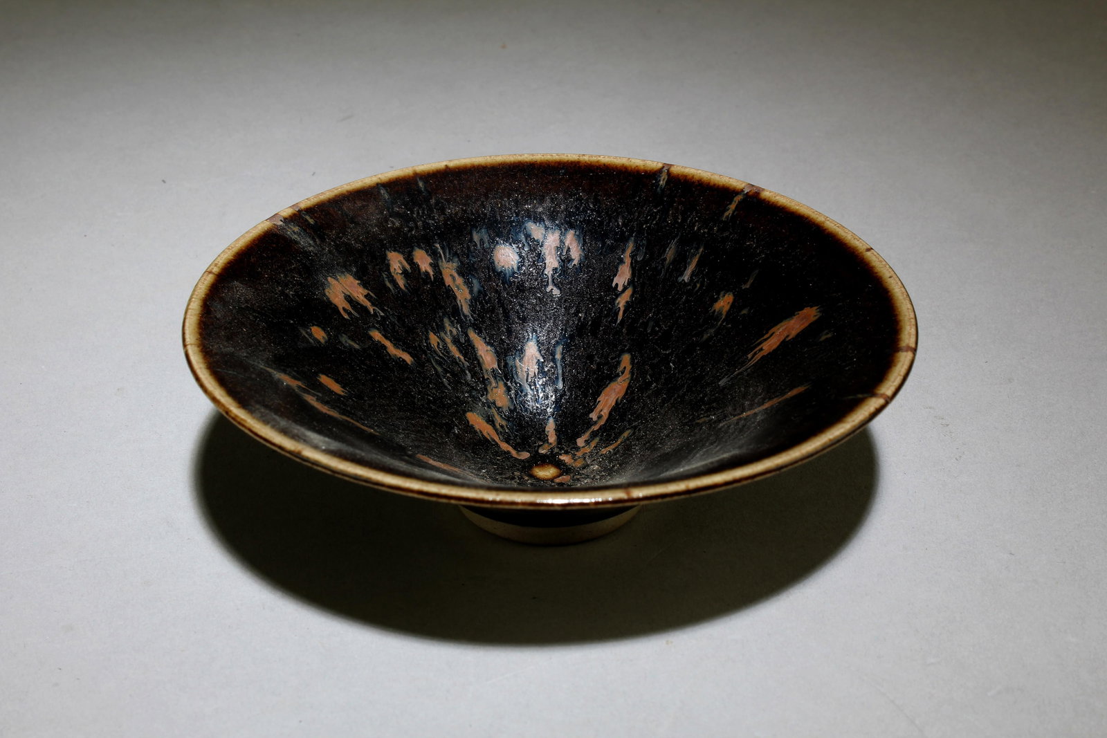 A Chinese JiZhou Tea Bowl: A Chinese JiZhou Tea Bowl. Dimensions: 1.5" x 4.9".