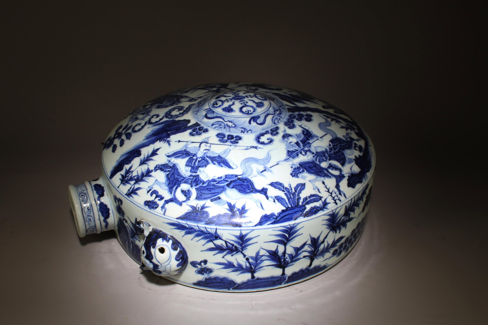 A Blue and White Ornament: A Blue and White Ornament. Dimensions: 17.5" x 16".