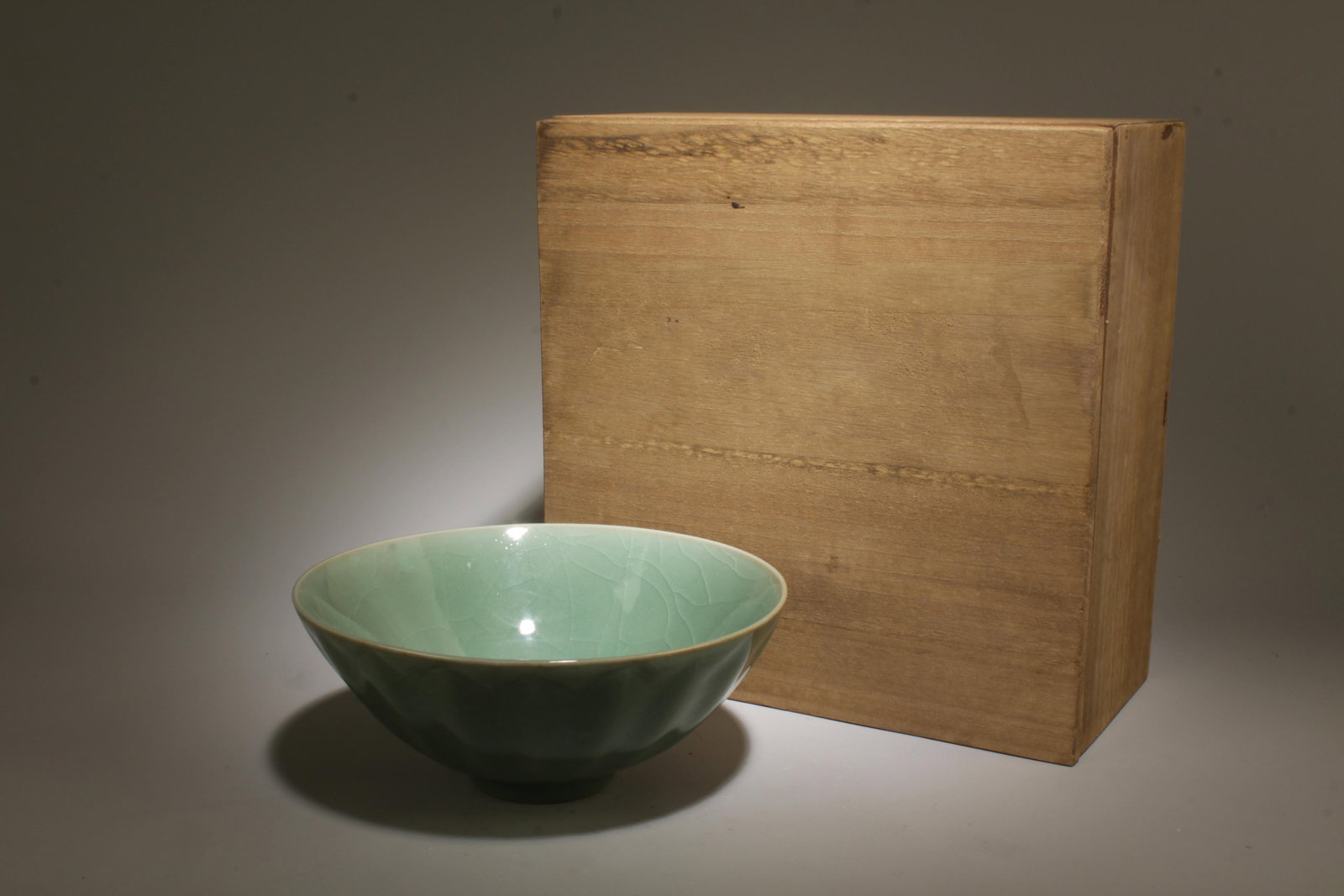 A Longquan Bowl with Box: A Longquan Bowl with Box. Dimension: 6.8" x 2.8"