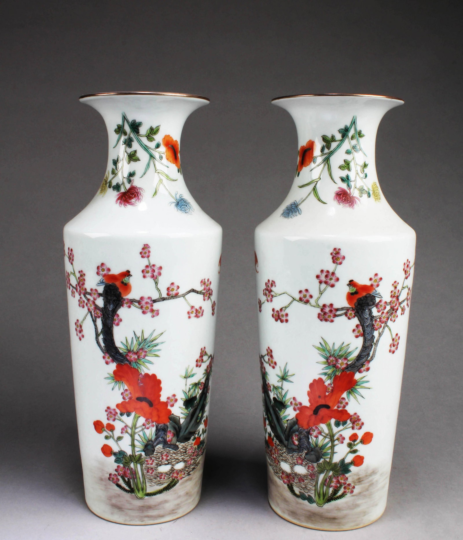 A Pair of Chinese Famille Rose Porcelain Vases: A Pair of Chinese Famille Rose Porcelain Vases. 'QianLong' mark at base. Height: 12"