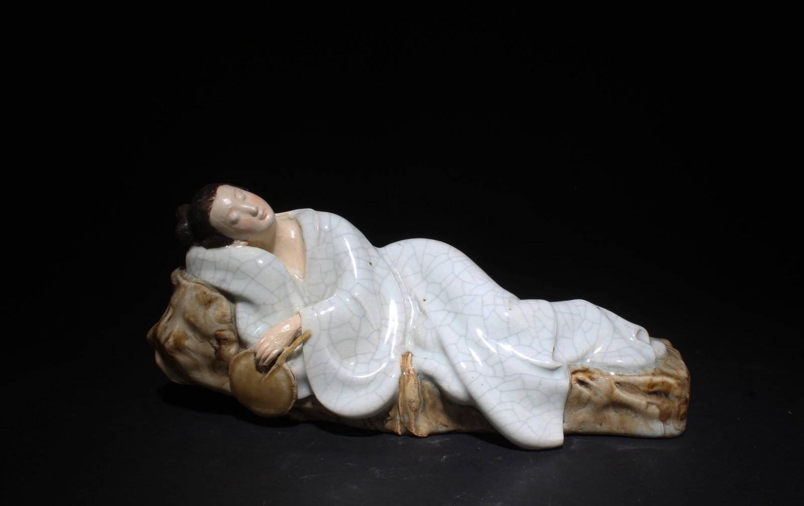 A Shiwan Pottery Laying Figure (1 of 5)