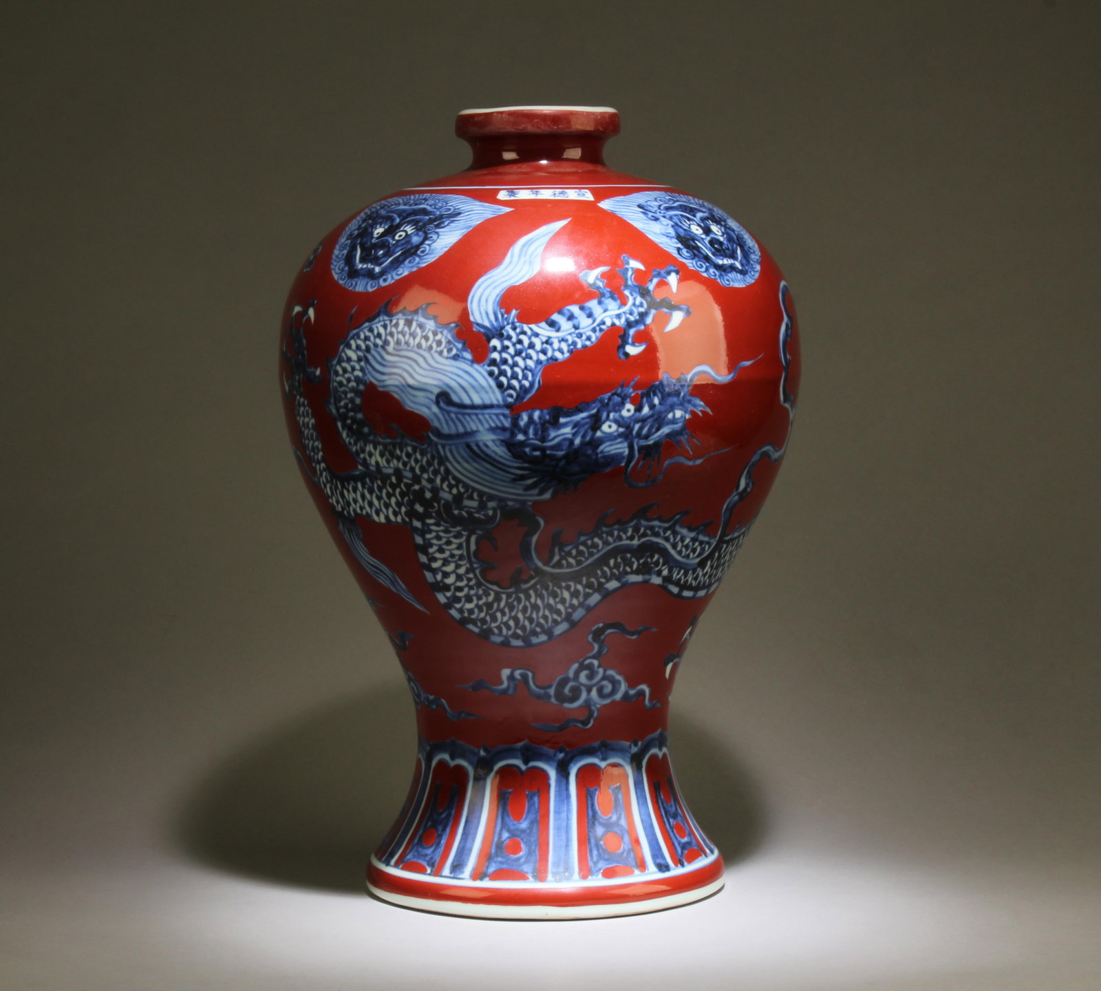 A Blue and Red Vase: A Blue and Red Vase. Dimensions: 15.75" x 10.25".