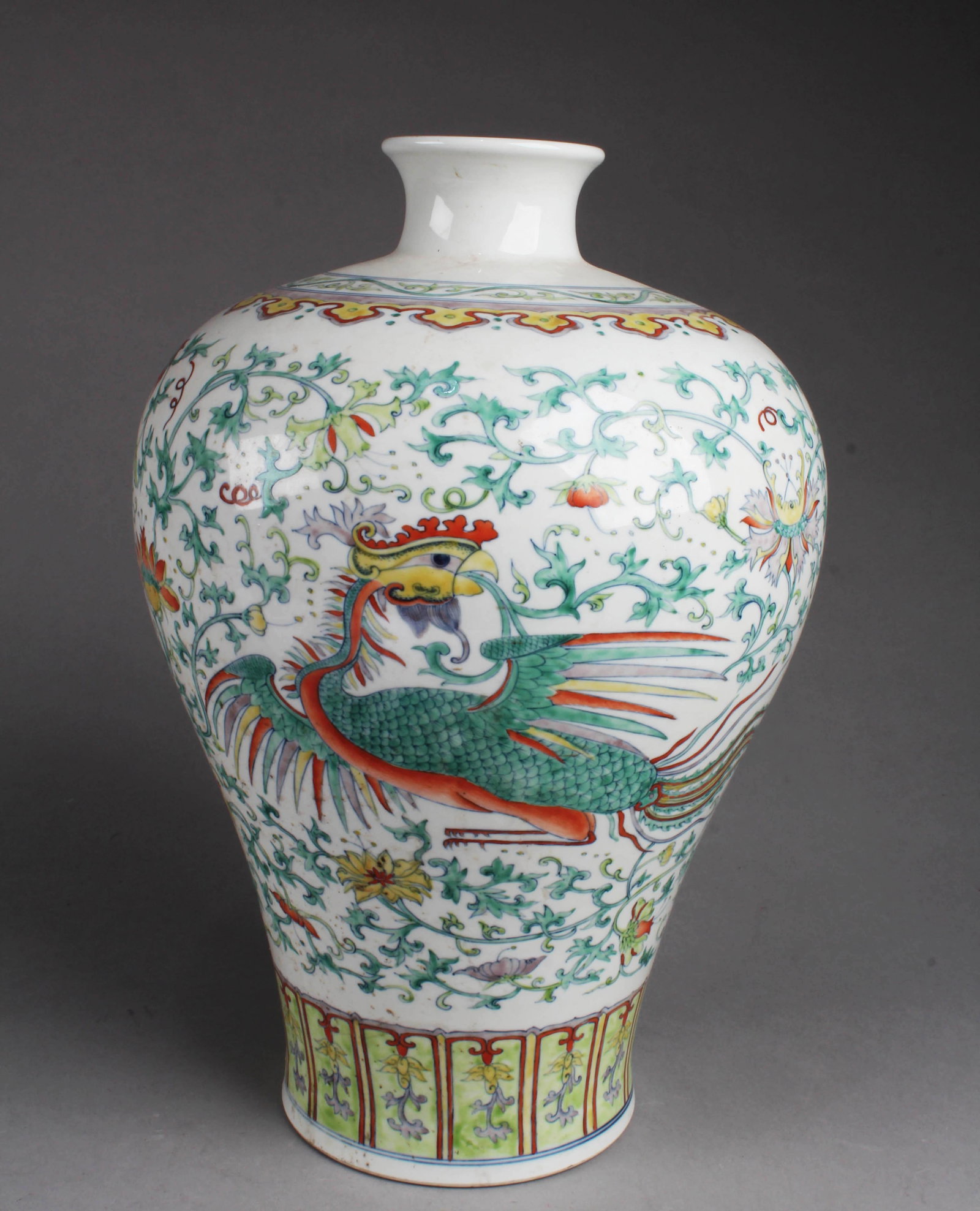 Chinese Doucai Porcelain Vase: Chinese Doucai Porcelain Vase. 'QianLong' mark at base. Height: 15"