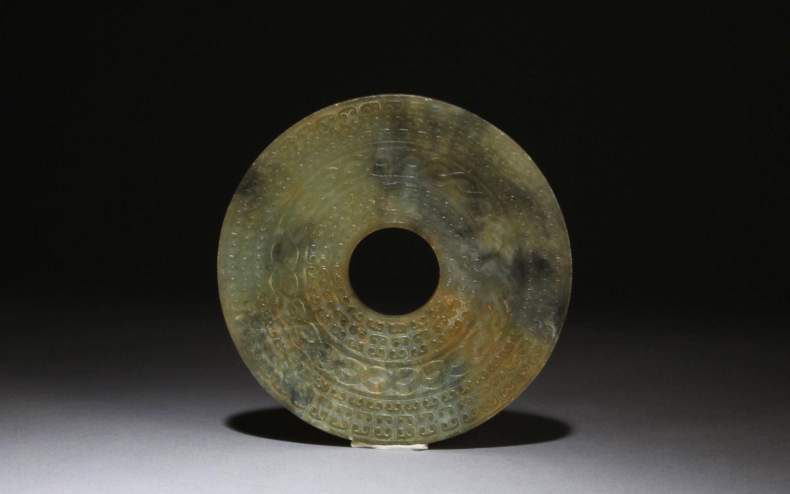 A Carved Jade Bi (1 of 4)