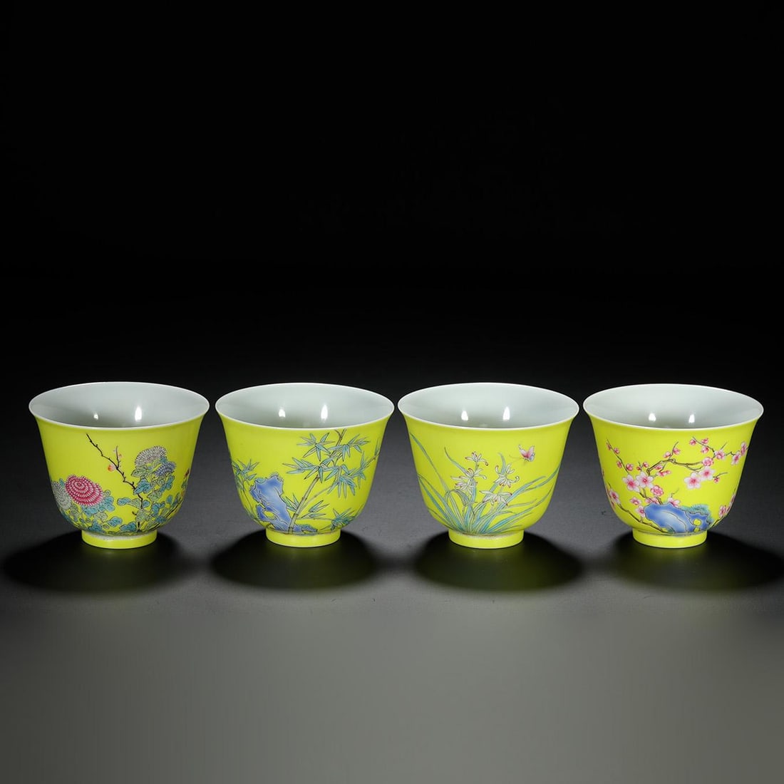 Set of Four Yellow-Ground Famille-Rose Floral Cups: Set of Four Yellow-Ground Famille-Rose Floral Cups. Diameter: 2.56in; Height: 1.97in.