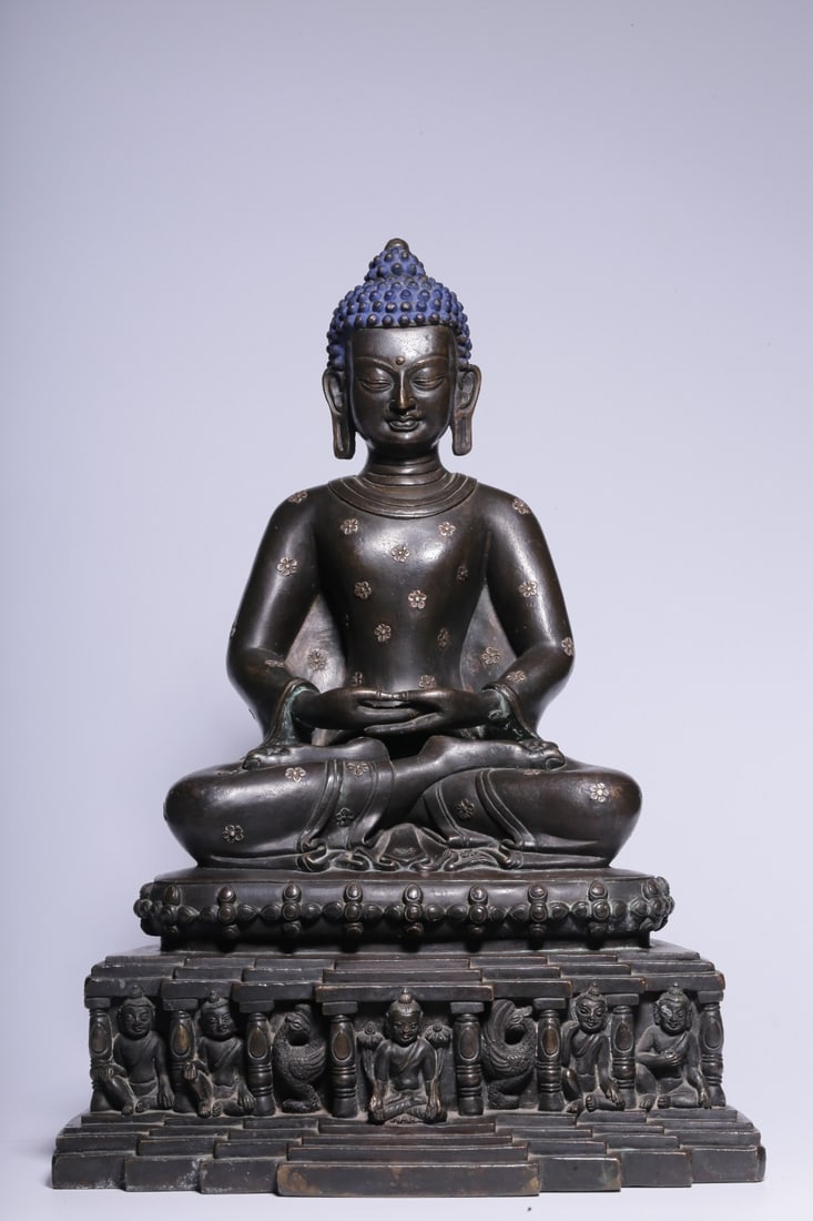 A Gilt Bronze and Silver Inlaid Amoghapasha Statue: A Gilt Bronze and Silver Inlaid Amoghapasha Statue. Dimensions: 11.81in x 8.07in x 6.30in; Weight: 21.78lbs.