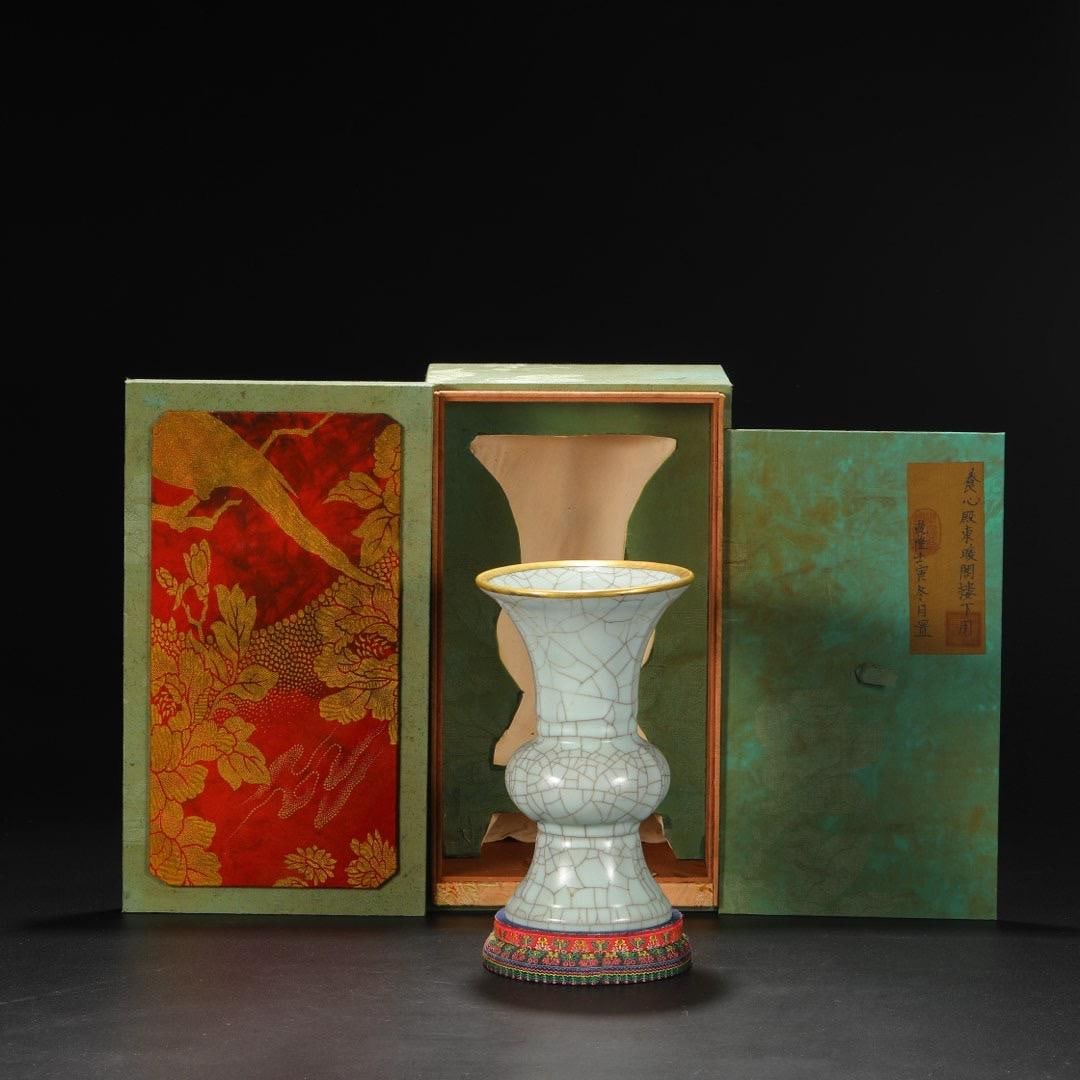 A Guanware Vase with Gilt Rim: A Guanware Vase with Gilt Rim. Height: 9.25in; Diameter: 5.51in.