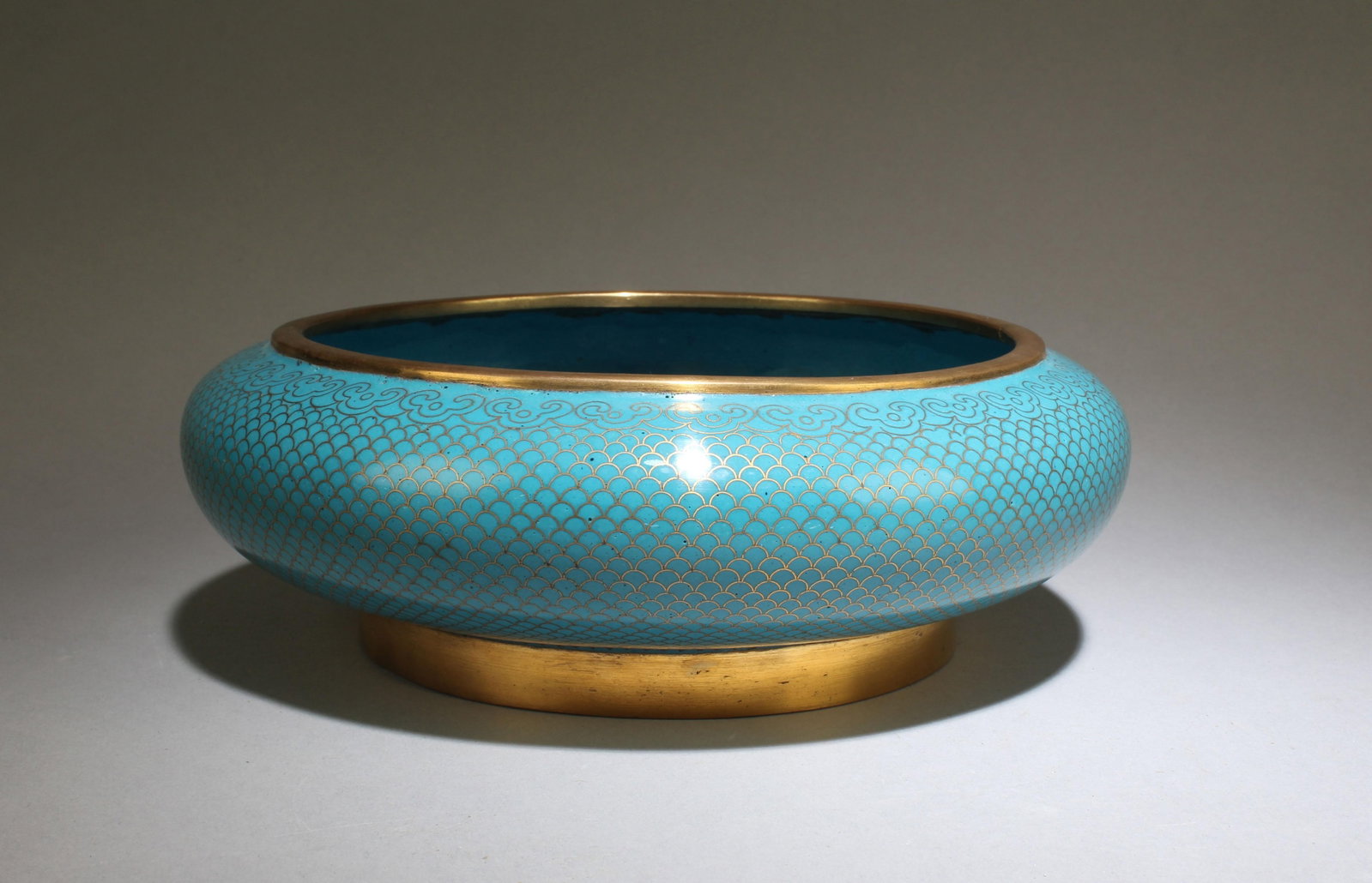 A Quality Copper Cloisonne Bowl: A Quality Copper Cloisonne Bowl Of Late Qing Dynasty (1880-1910 Ad). The center has a shou word (壽). H. 6.7, Dia. 20.1 cm; 865 grams. From Dr. Robert I-San Lin (87 years old), a senior Chinese 