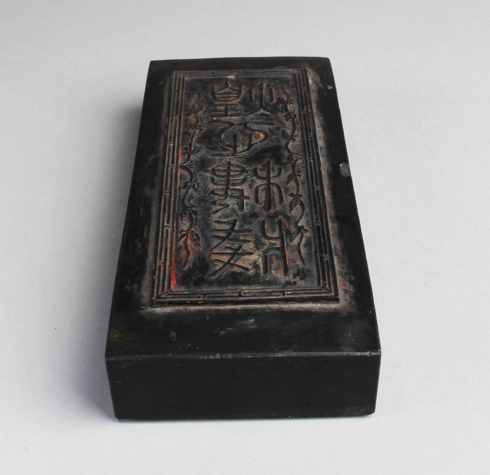 A Carved Stone Paper Weight: A Carved Stone Paper Weight. Length: 3" Width: 1.25" Height: 7"