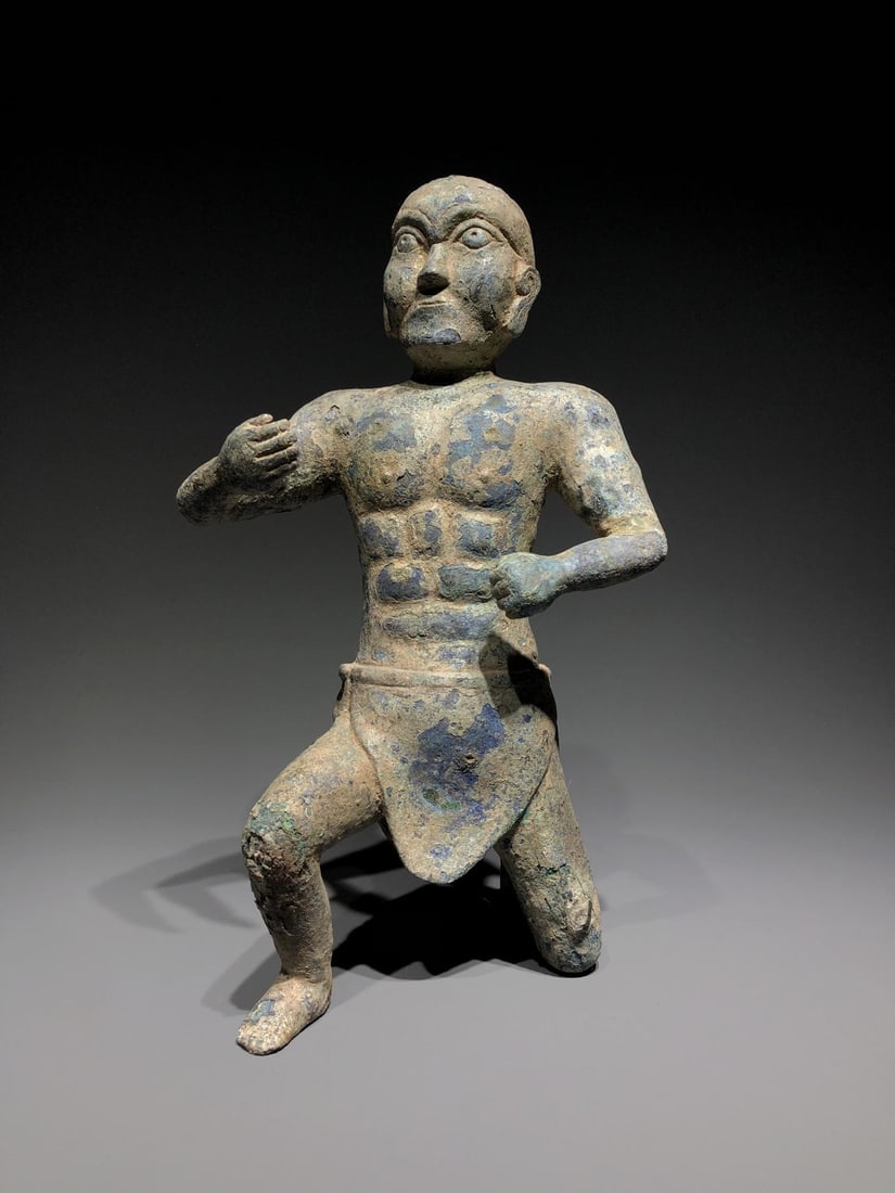 A Northern Dynasties Warrior Figure: A Northern Dynasties Warrior Figure. Dimensions: 8.66in x 7.87in x 14.96in Weight: 7lbs.