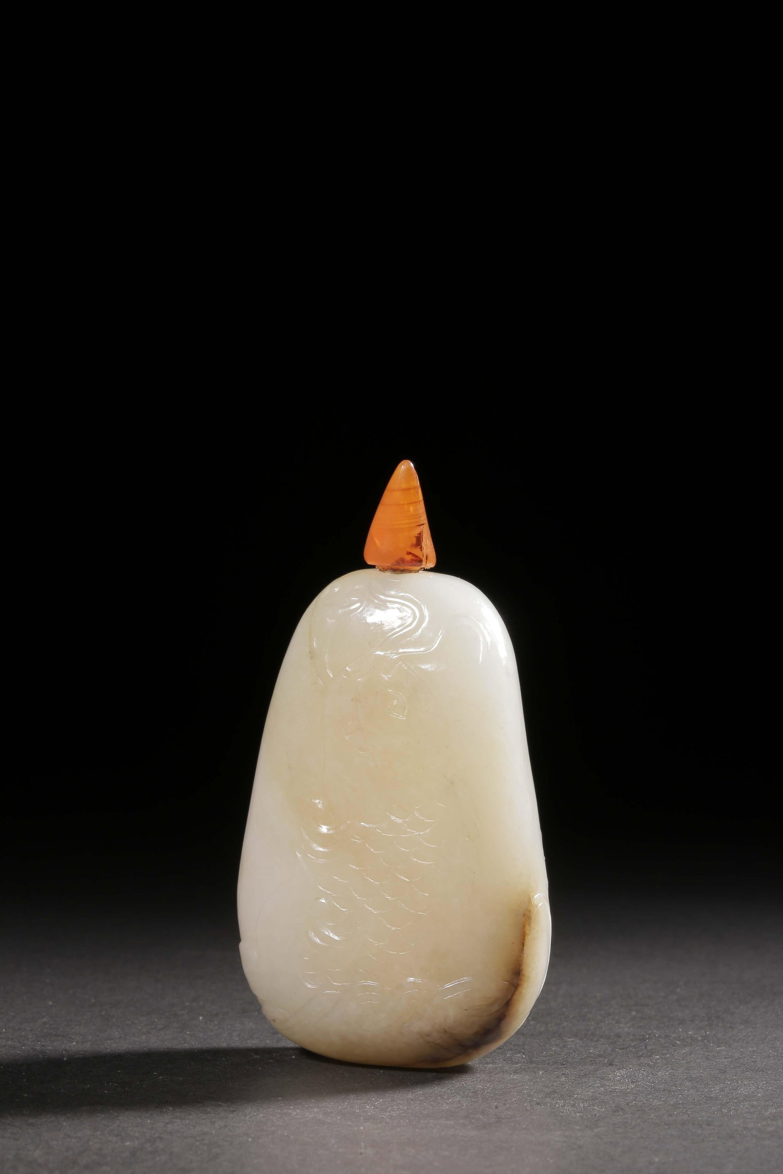 A Hetian Jade Snuff Bottle: A Hetian Jade Snuff Bottle. Dimensions: 3.82in x 2.05in x 1.14in Weight: 0.24lbs.