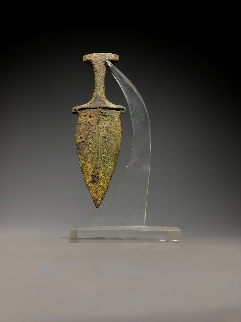 A Stone Dagger: A Stone Dagger. Dimensions: 7.48in x 2.36in Weight: 0.57lbs.