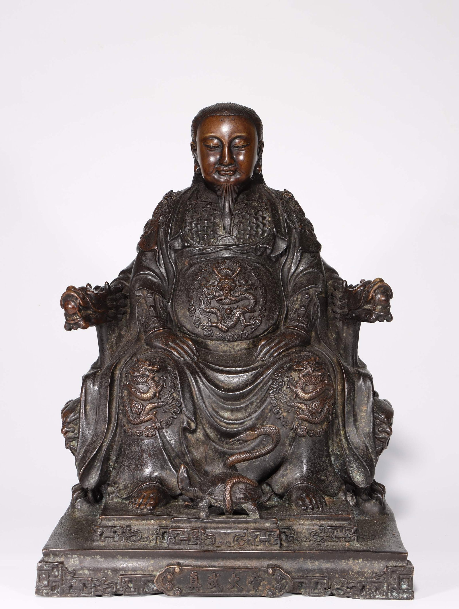 A Bronze Zhenwu Statue: A Bronze Zhenwu Statue. Dimensions: 14.96in x 10.43in x 9.06in Weight: 26.46lbs.