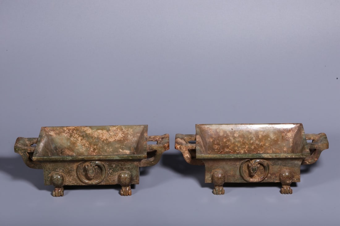 A Pair of Archaic Jade Censers: A Pair of Archaic Jade Censers. Dimensions: 2.17in x 7.68in x 4.21in Weight: 0.86lbs, 0.82lbs.