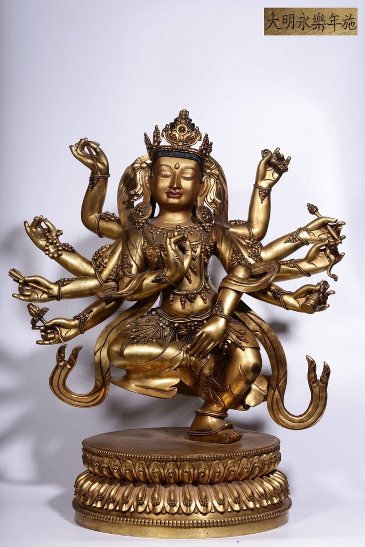 A Gilt Bronze Twelve-Armed Deity Statue (1 of 14)