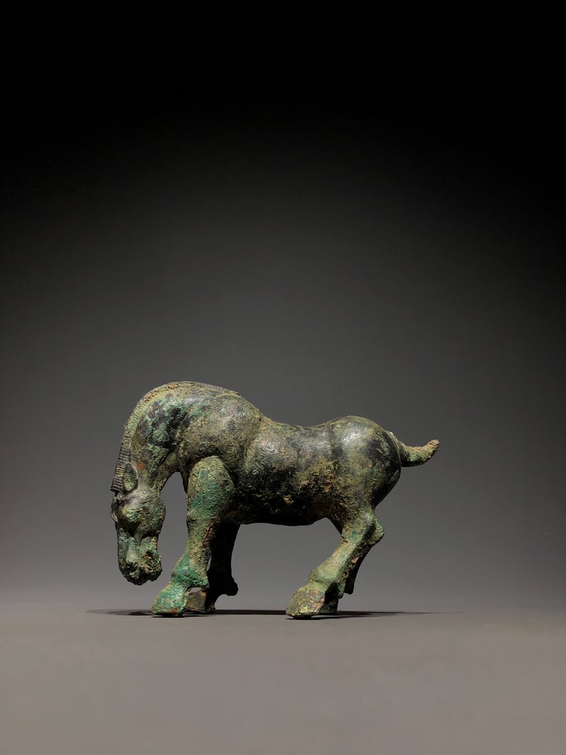 A Bronze Horse: A Bronze Horse. Dimensions: 5.91in x 2.56in x 4.33in Weight: 4.63lbs.