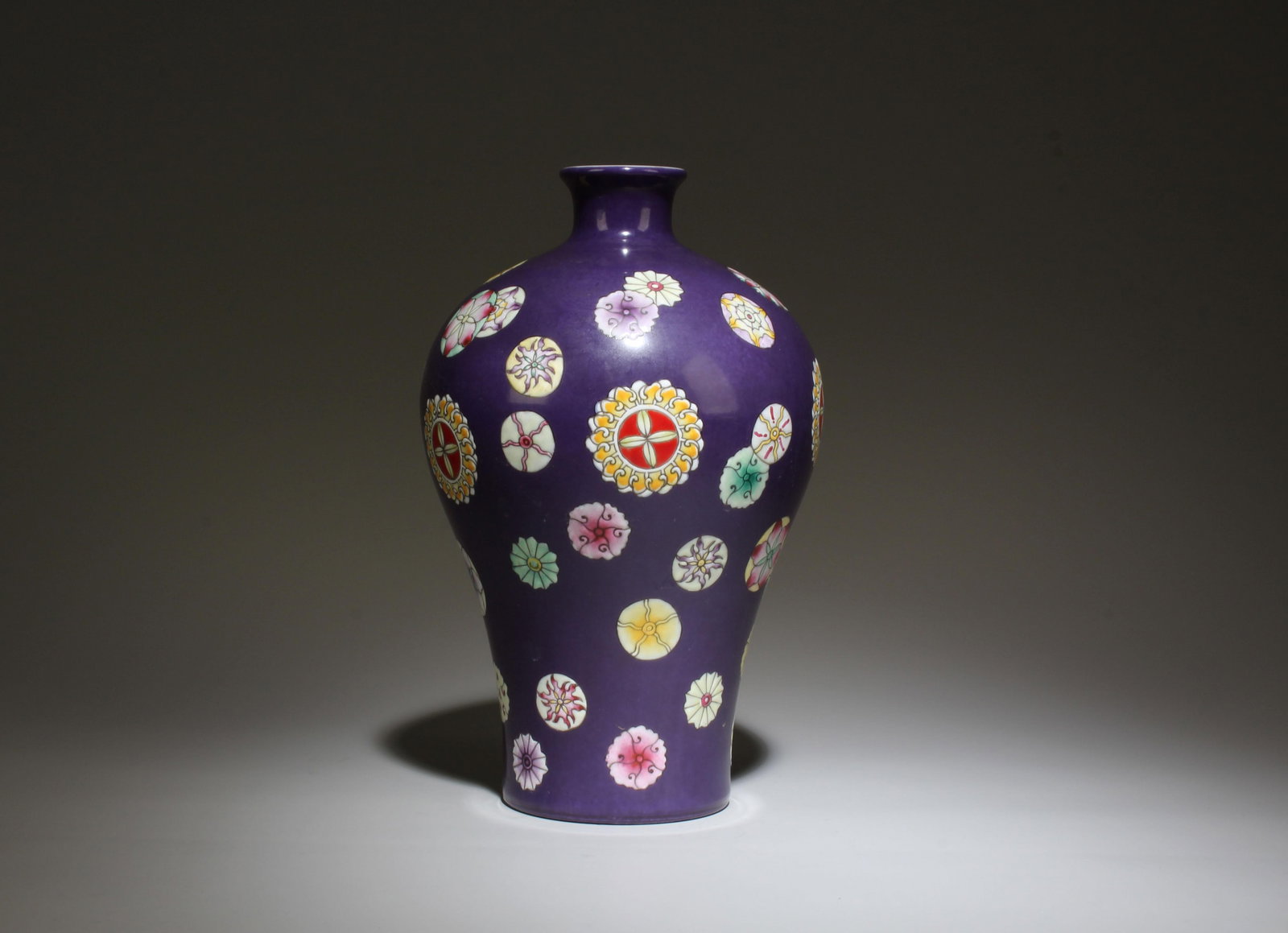 A Multi-Colored Vase: A Multi-Colored Vase. Dimensions: 7.5" x 4.5".