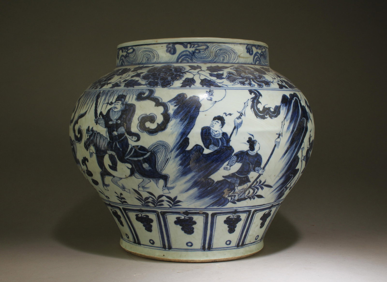A Blue and White Jar with Figure Motif: A Blue and White Jar with Figure Motif. Dimensions: 11.5" x 13".