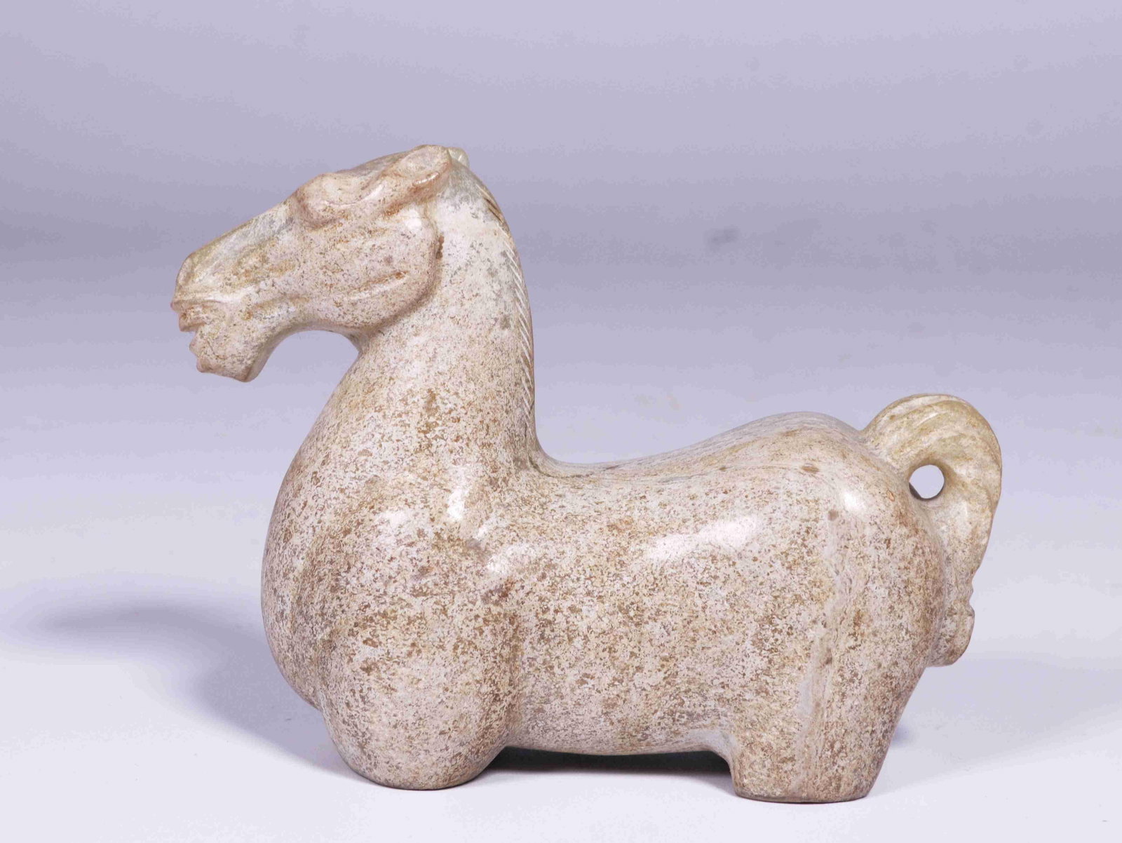 A Jade Horse: A Jade Horse. Dimensions: 3.43in x 1.42in x 2.76in.