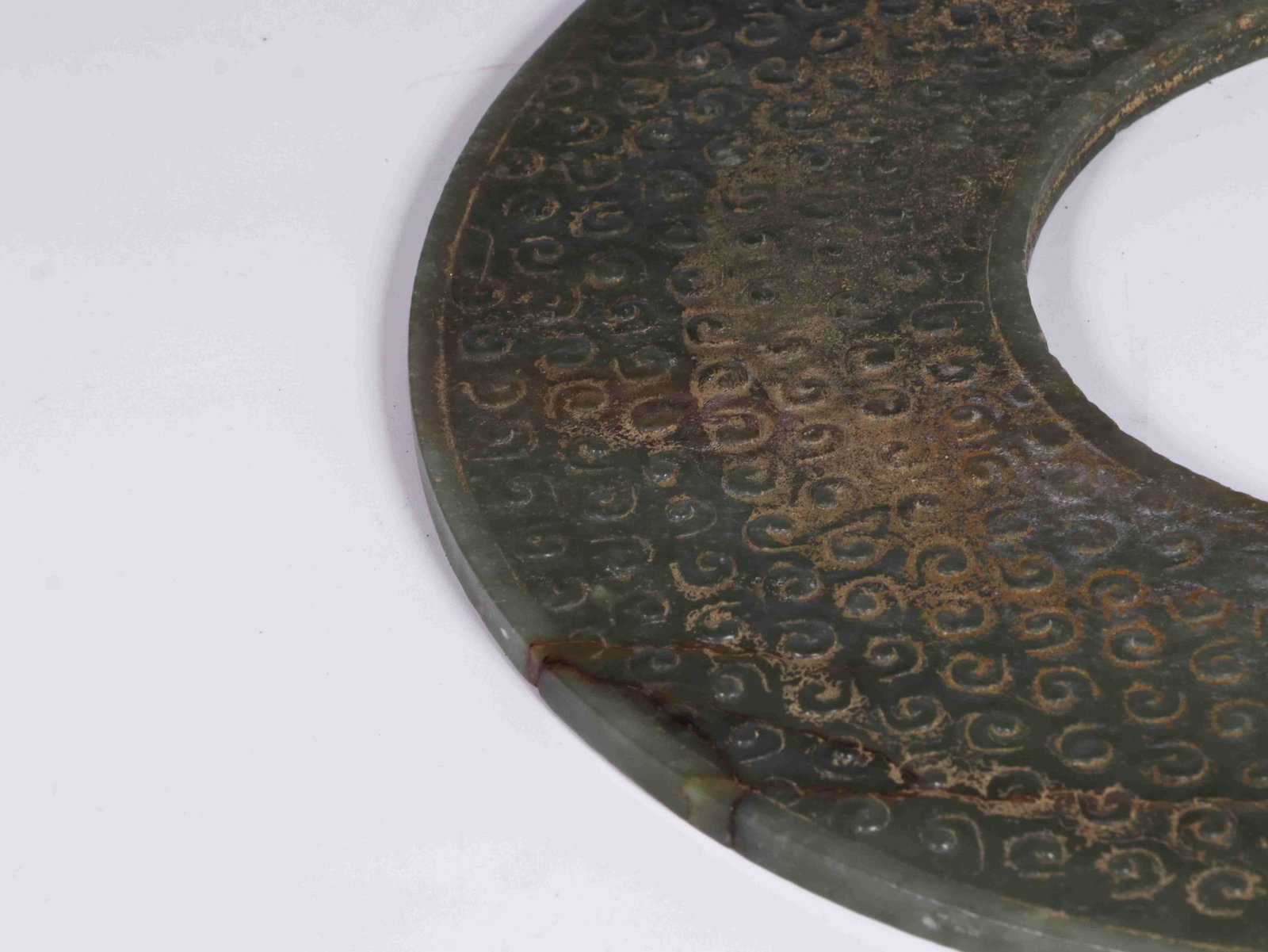 A Jade Ring: A Jade Ring. Diameter: 11.81in Thickness: 0.26in.