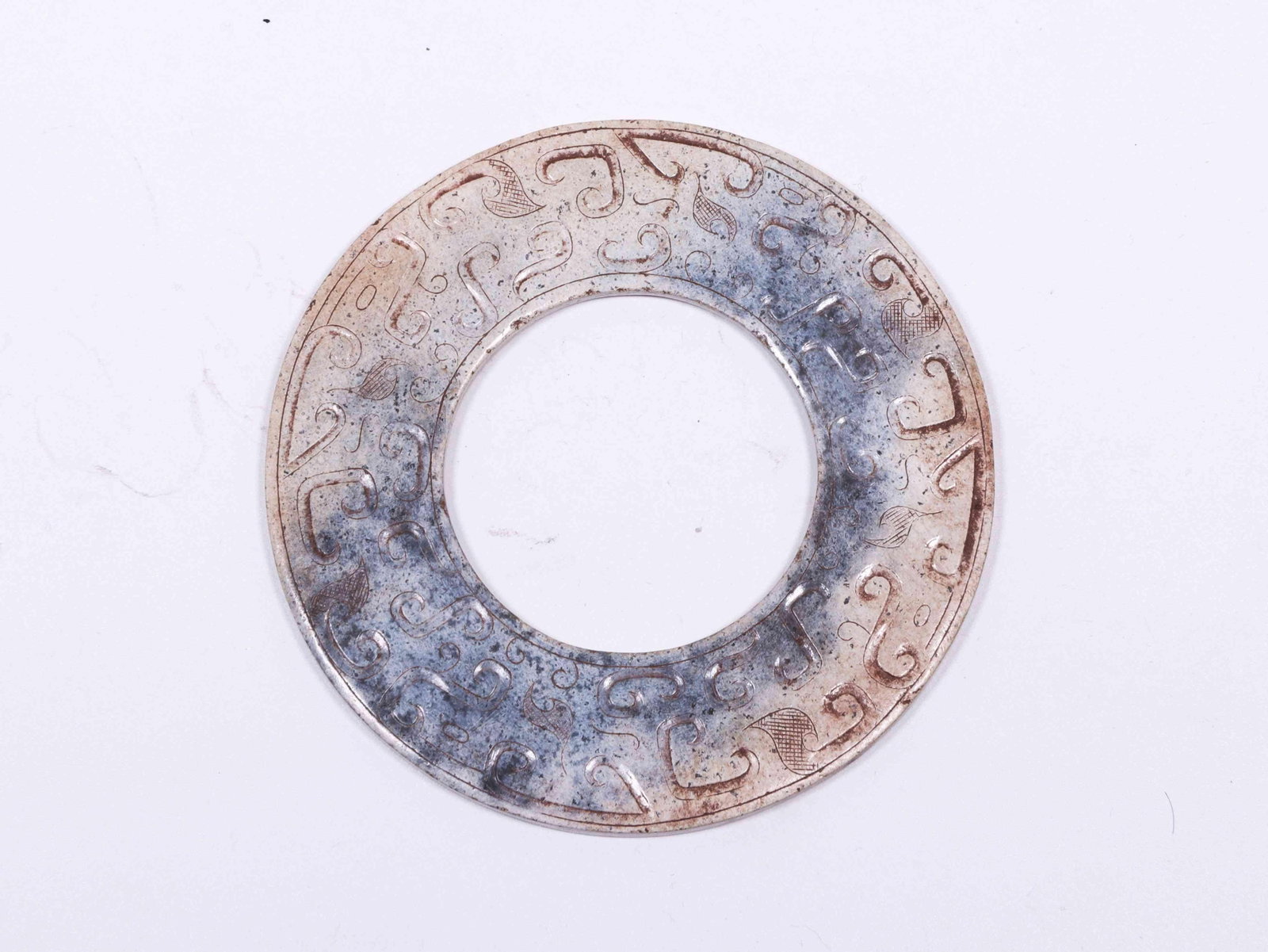 A Jade Ring: A Jade Ring. Diameter: 3.94in Thickness: 1.77in.