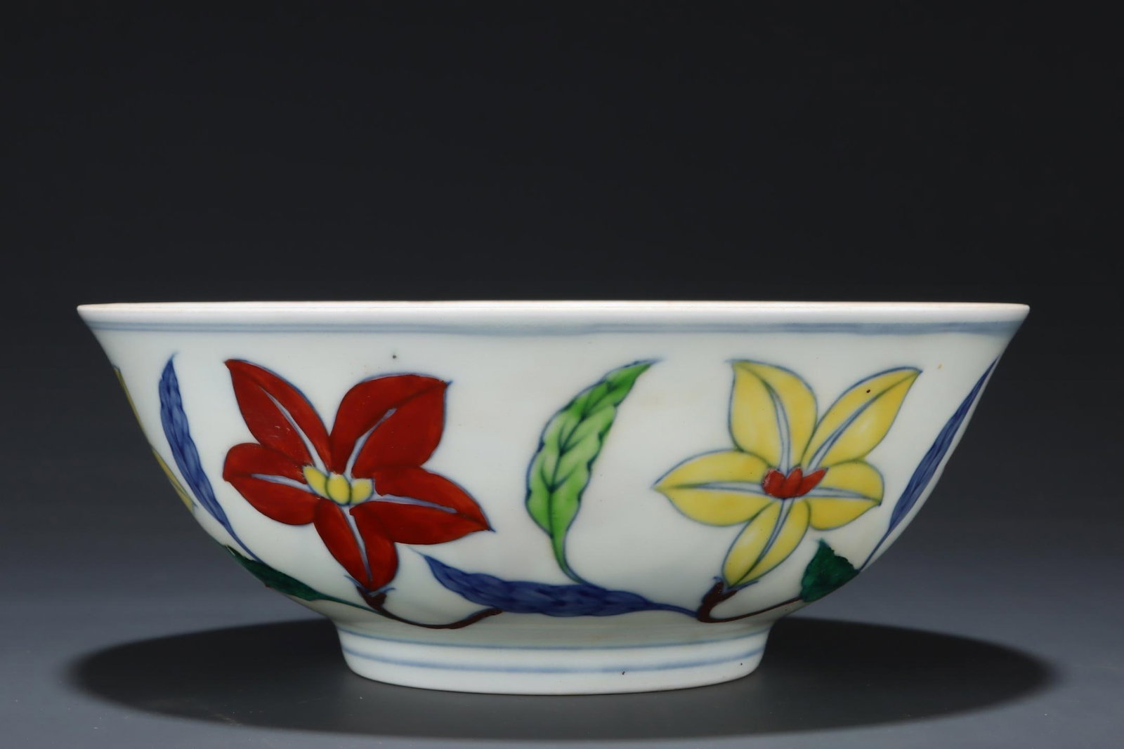 A Blue & White Doucai Porcelain Bowl: A Blue & White Doucai Porcelain Bowl. Height: 2.95in Diameter: 7.68in.