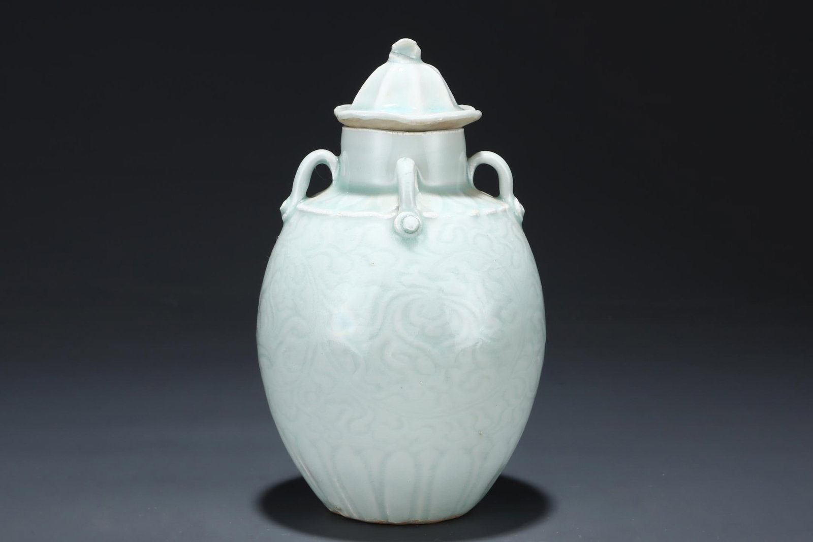 A Qingbai Glazed Lidded Jar: A Qingbai Glazed Lidded Jar. Height: 6.30in Diameter: 3.94in.