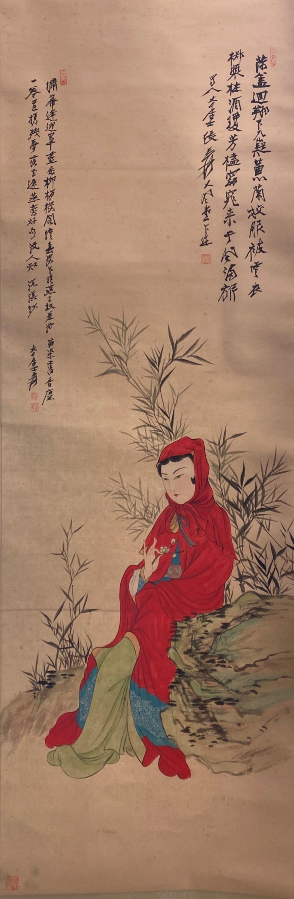 Chinese Hanging Scroll Painting: Ink and color on paper, depicting a portrait of a woman, signed with seal attributed to Zhang Da Qian. Height:54" Length: 19"